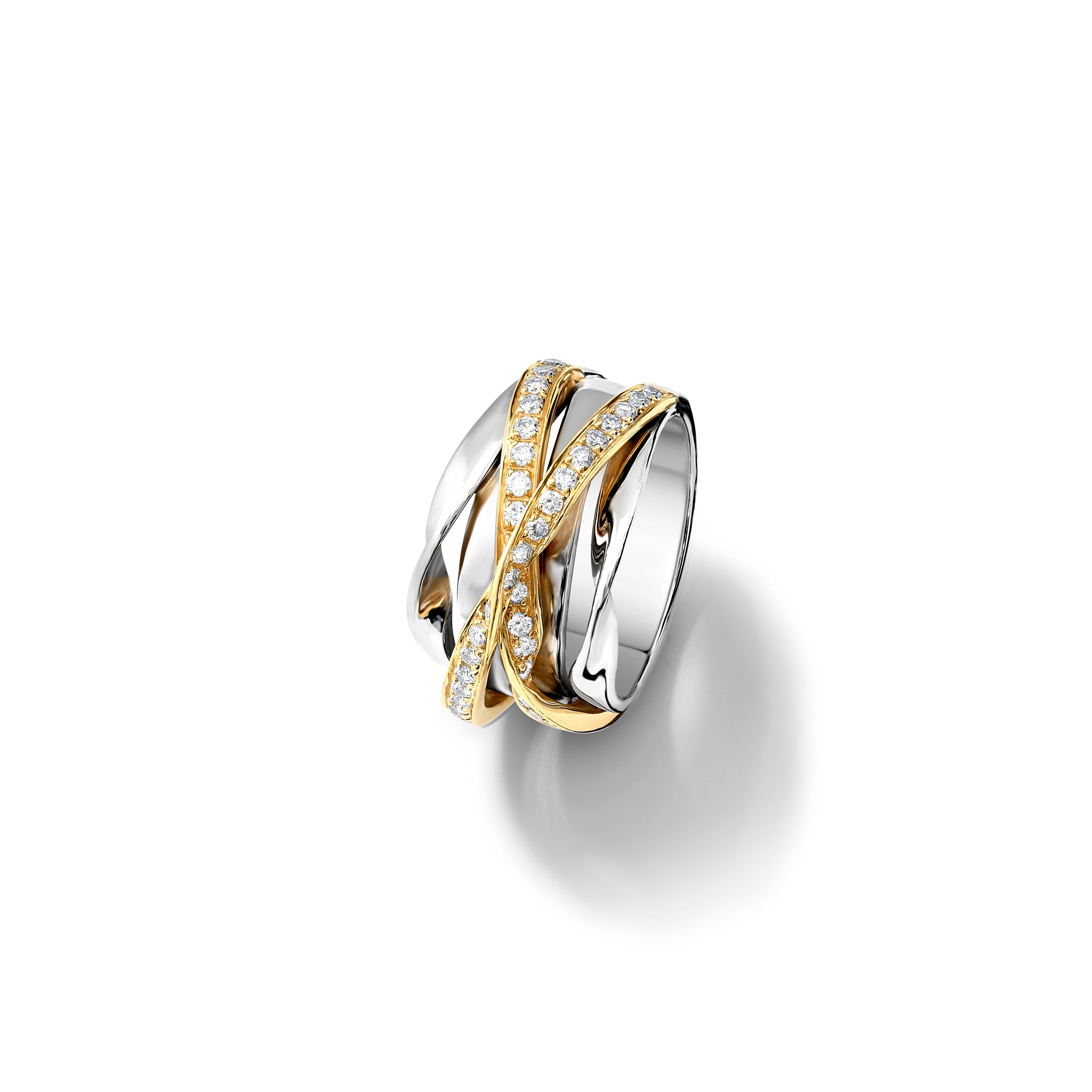 Handcrafted 18ct white and yellow gold ring featuring a nest of tagliatelle with diamonds.