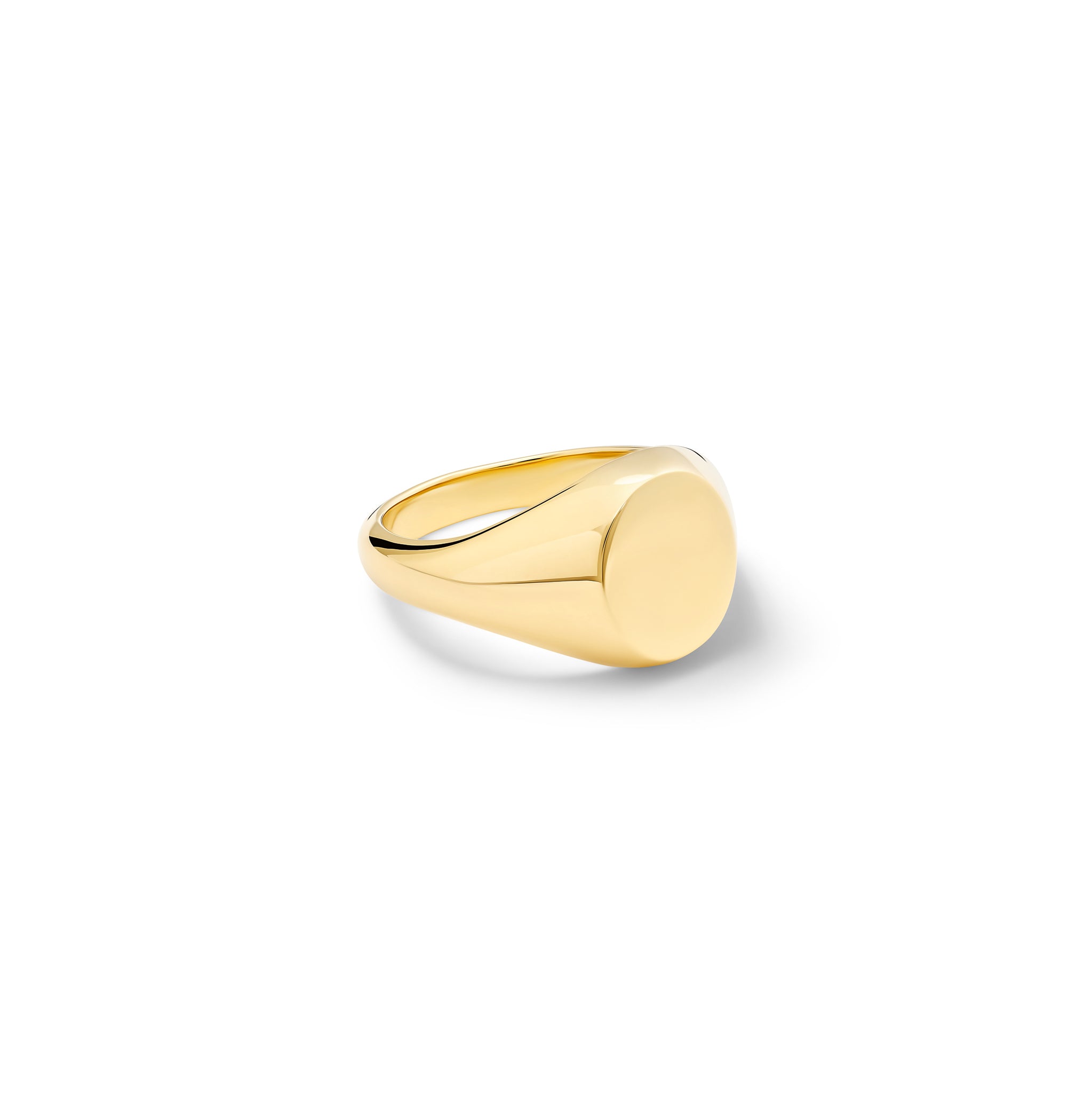 Handcrafted yellow gold signet ring featuring a small oval shape.