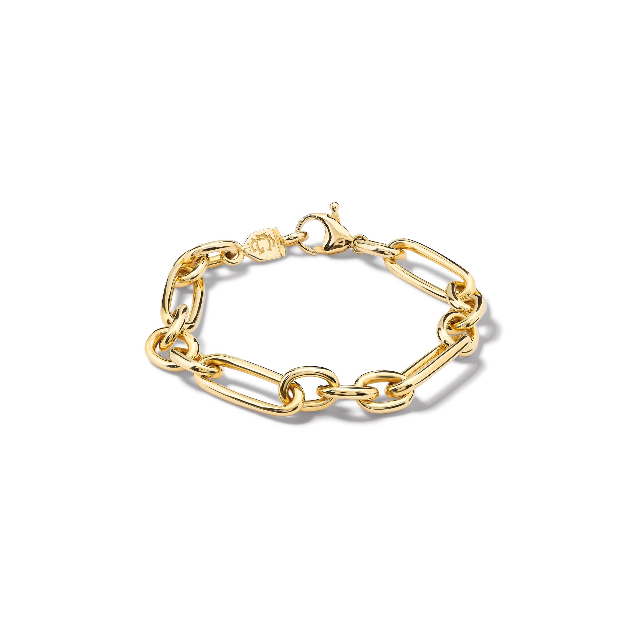 Handcrafted yellow gold link bracelet featuring chunky round and rounded rectangular links interconnected.