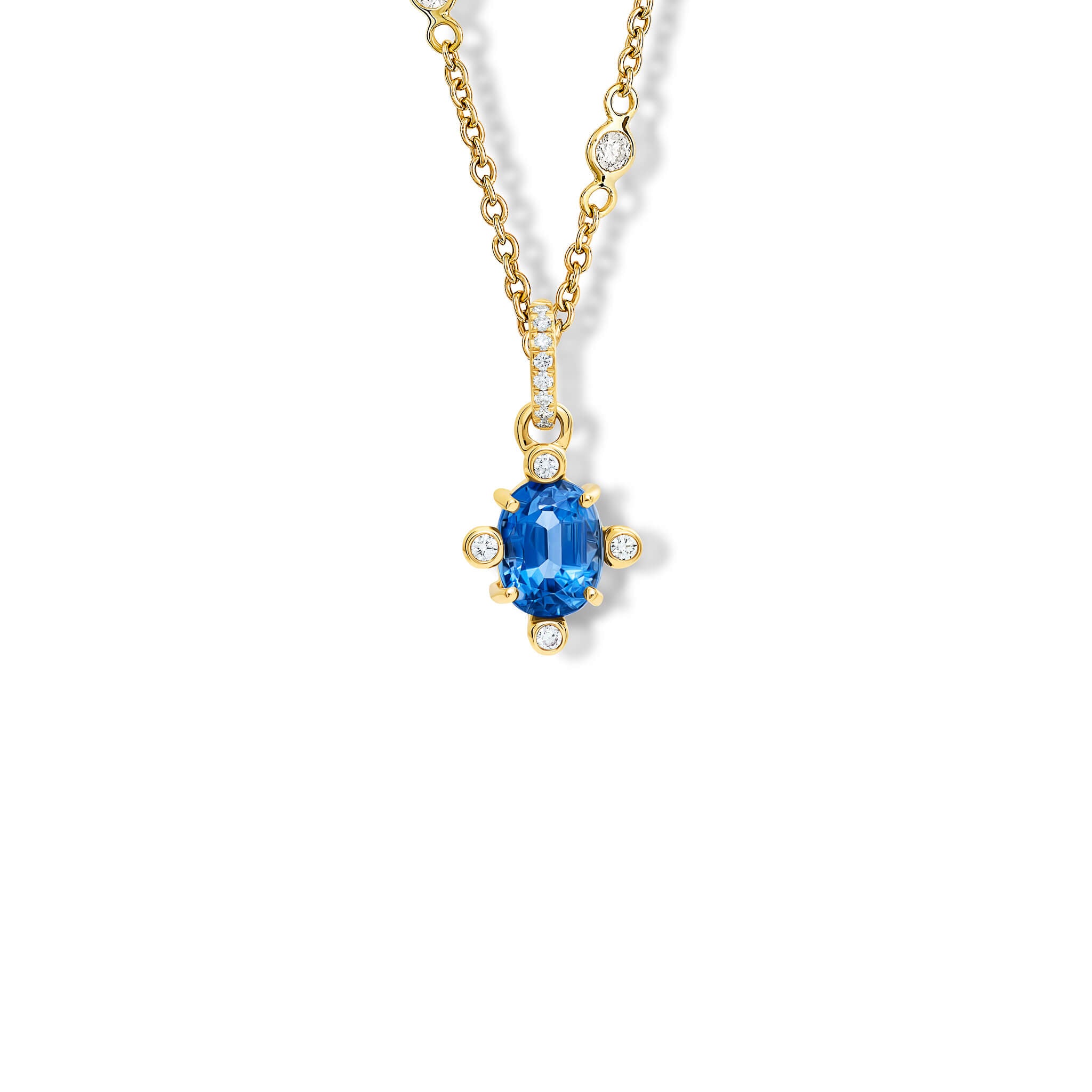 Handcrafted 18ct yellow gold Compass pendant with kyanite set with four diamonds and a yellow gold diamond pav? loop.