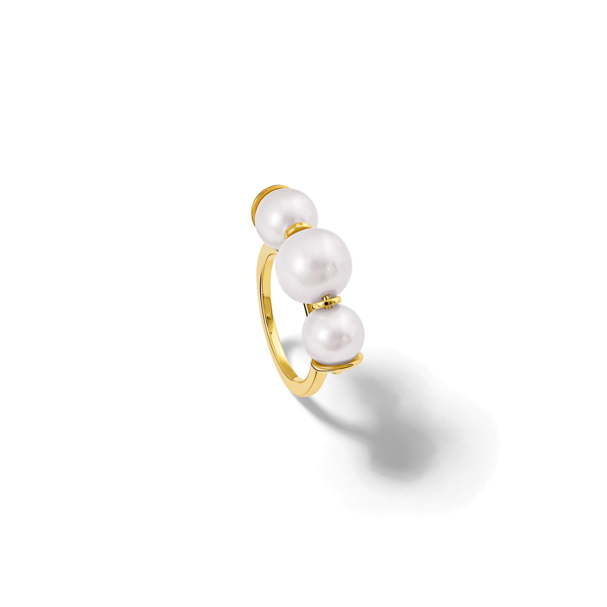 Handcrafted 9ct gold ring featuring three white pearl beads.