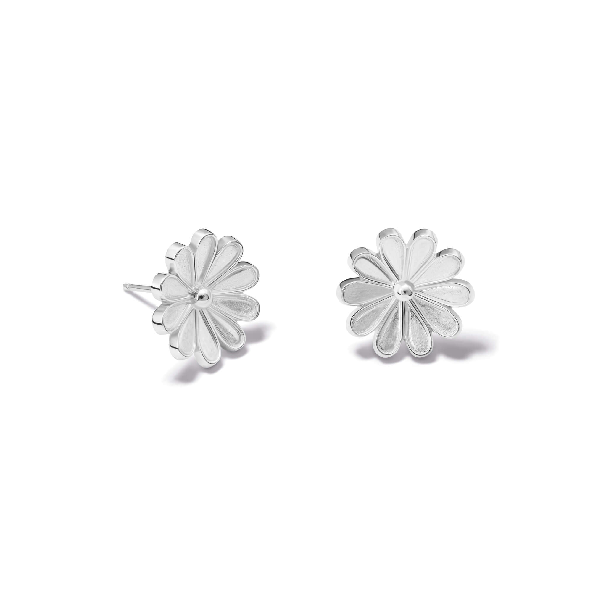 Handcrafted medium silver stud earrings of an anemone flower.