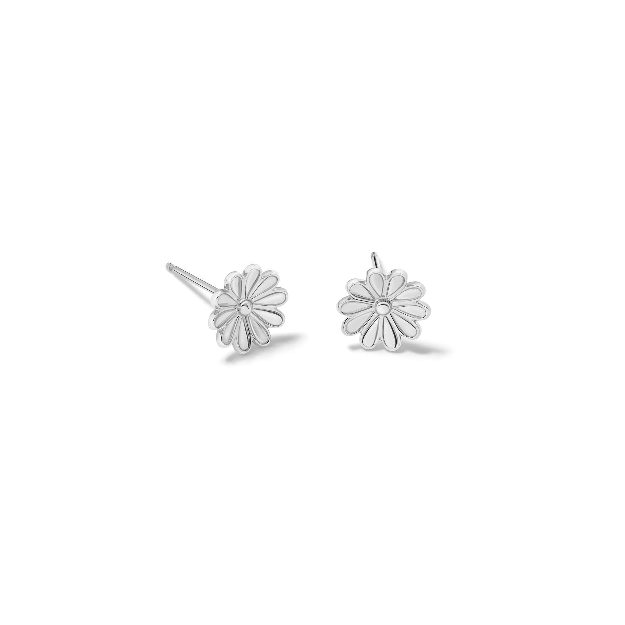 Handcrafted silver stud earrings of an anemone flower.