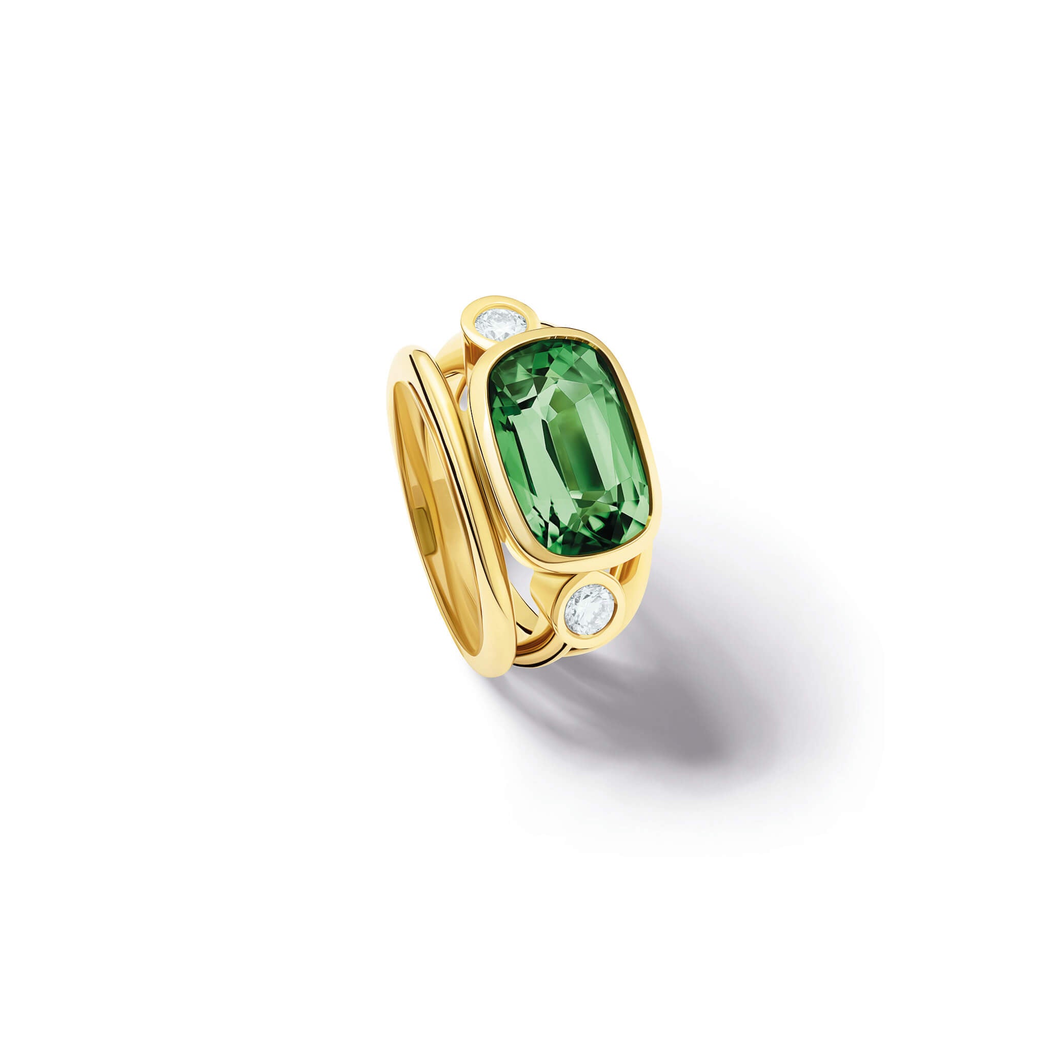 Handcrafted 18ct yellow gold ring with a central green tourmaline, the birthstone of October, flanked by two round diamonds.