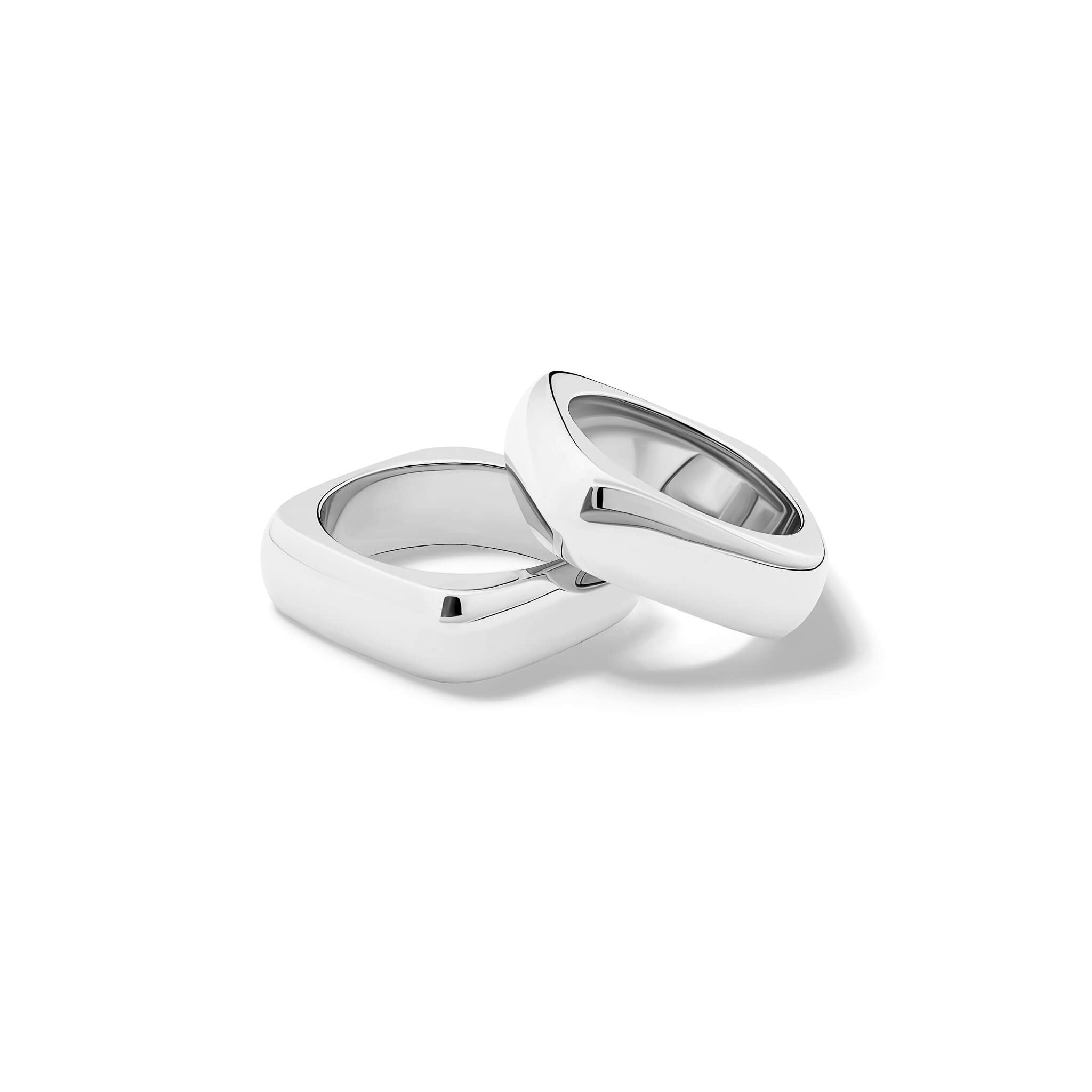 Handcrafted silver square-shaped rings with rounded corners inspired by traditional Greek architecture.