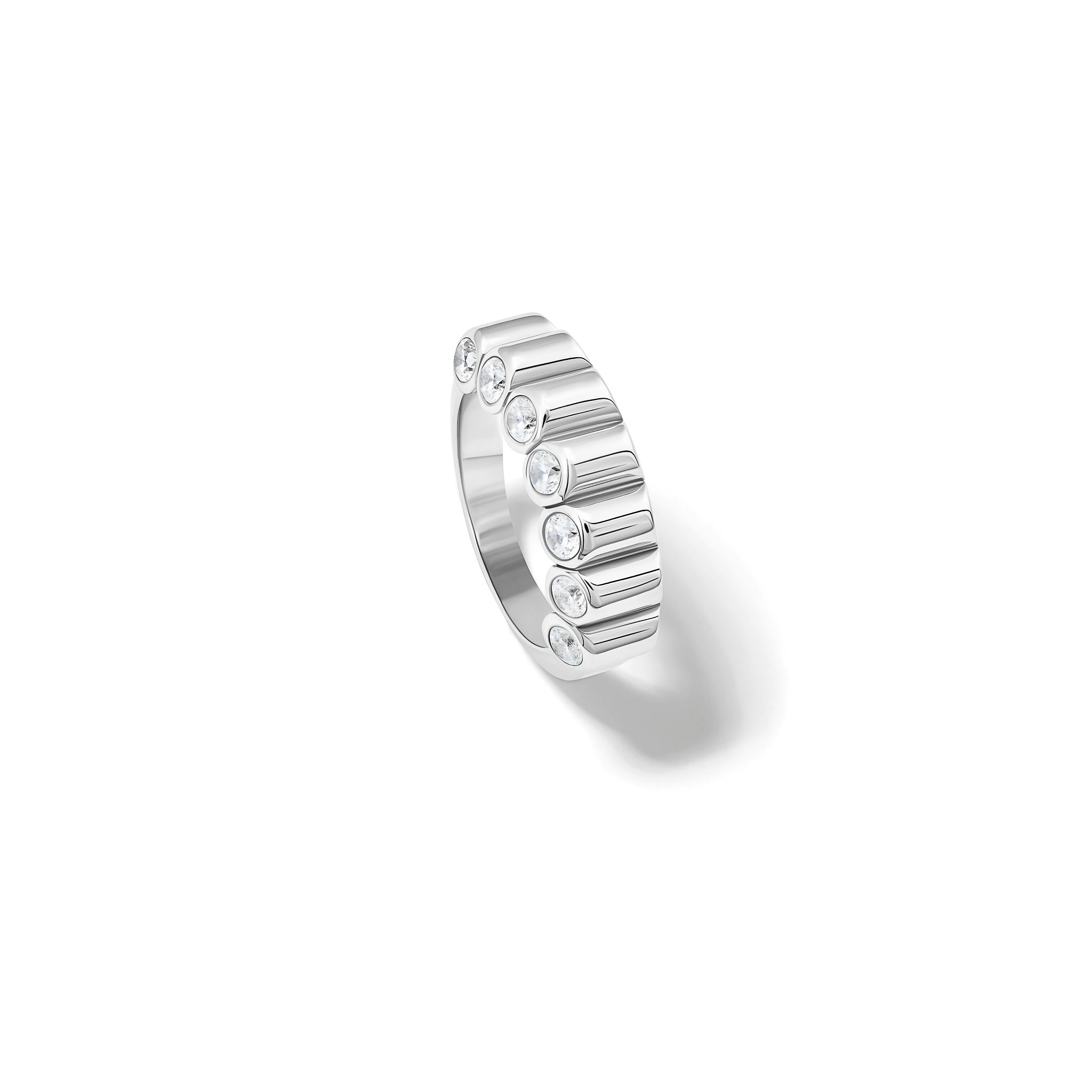 Handcrafted 18ct white gold eternity ring with diamonds on the side of the shank and smooth ridges along the top.