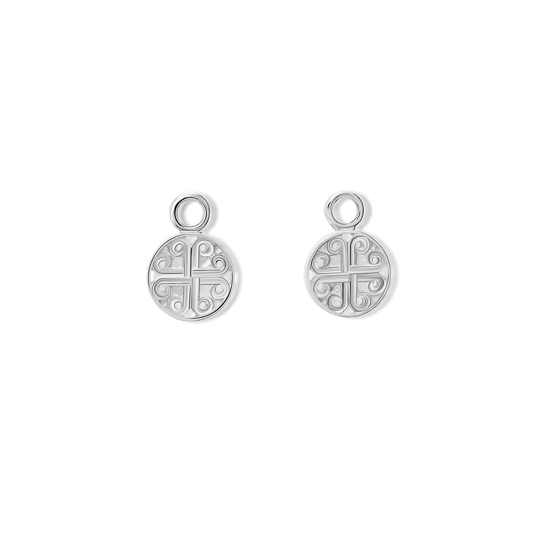 Handcrafted interchangeable silver circular earring drops with a cross-like motif in the centre.