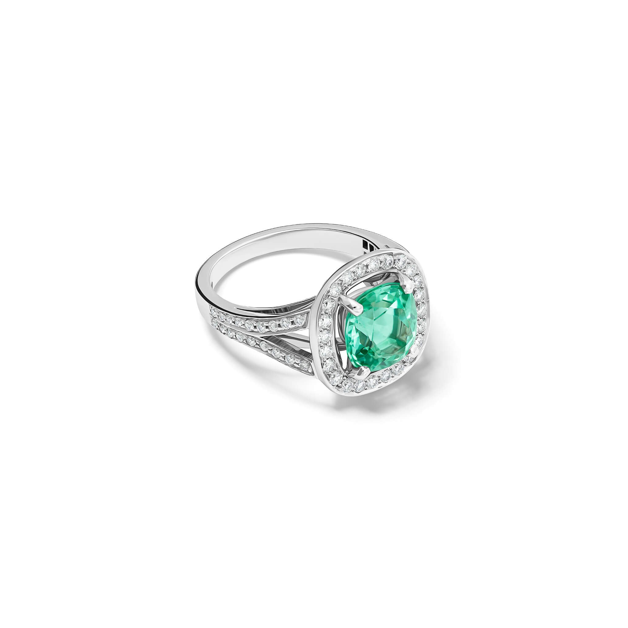 Handcrafted 18ct white gold engagement ring featuring a large, cushion-cut mint tourmaline surrounded by a halo of small diamonds and smaller diamonds embedded along the band.