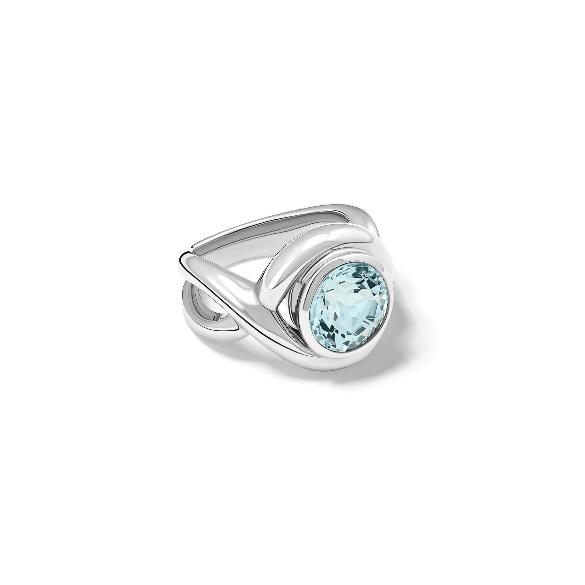 Handcrafted silver ring featuring curved shanks with a round blue topaz, birthstone of November.