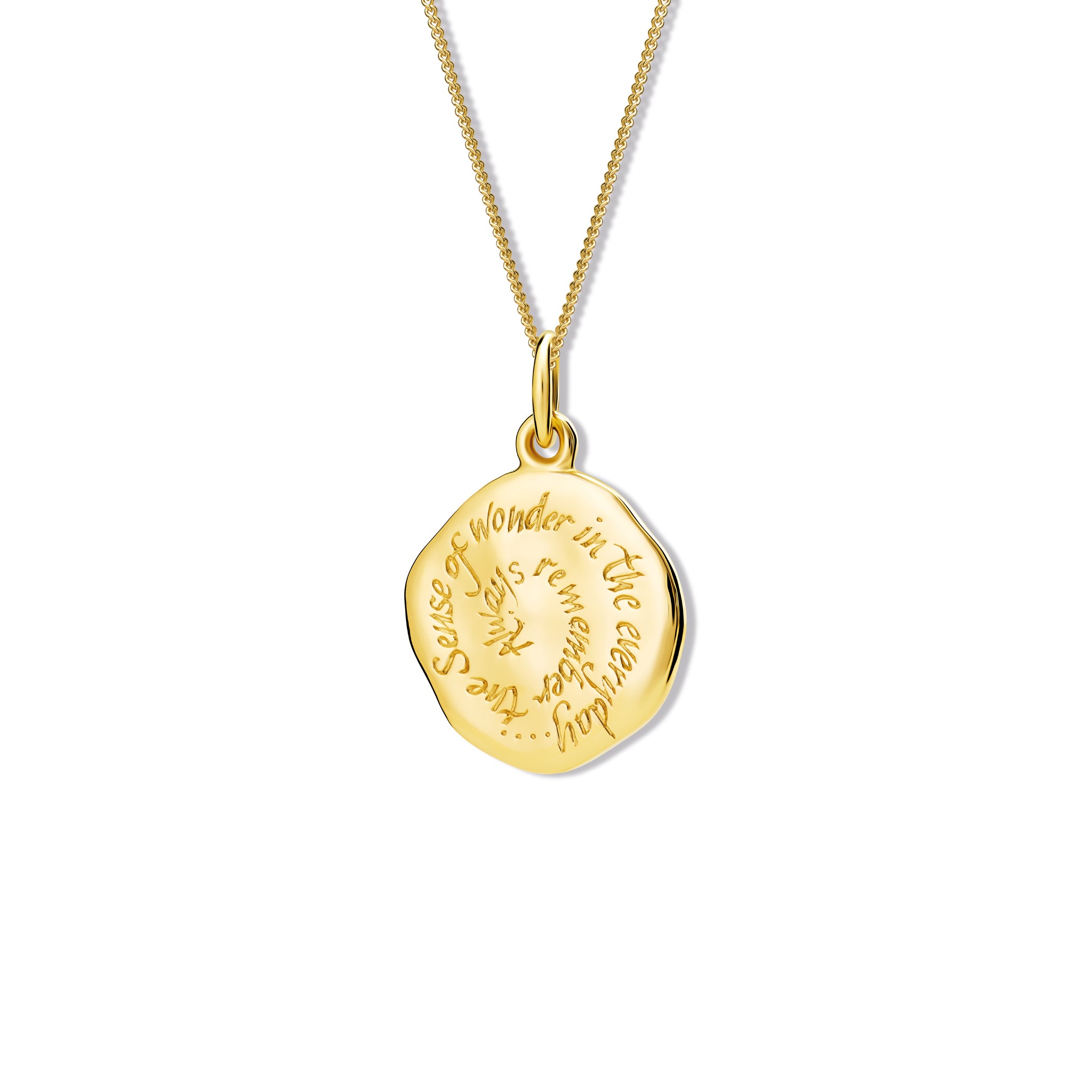 Handcrafted round yellow gold pendant necklace engraved with the quote, 'Always remember the sense of wonder in the everyday.'