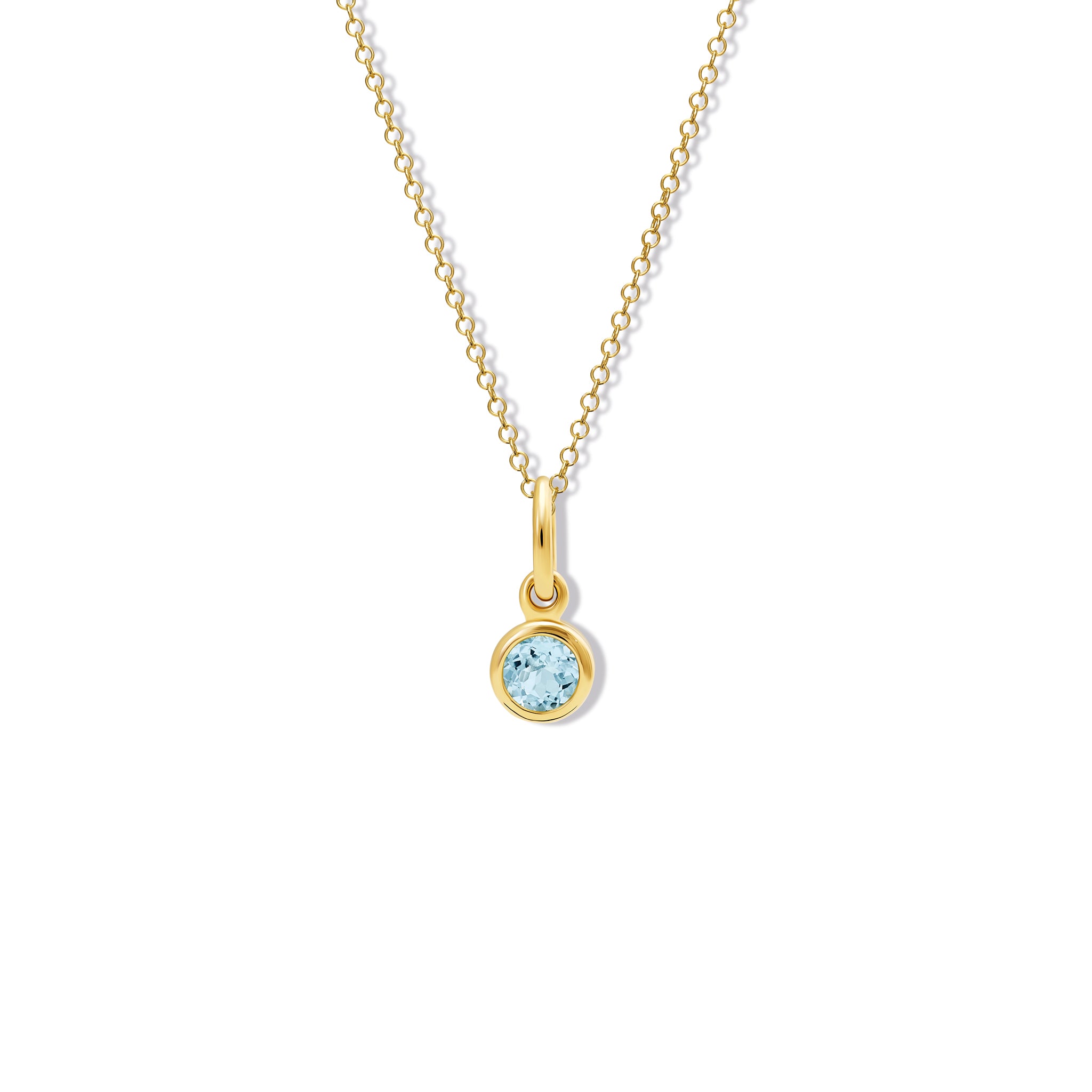 Handcrafted necklace pendant in yellow gold featuring a round blue topaz drop, birthstone of November.