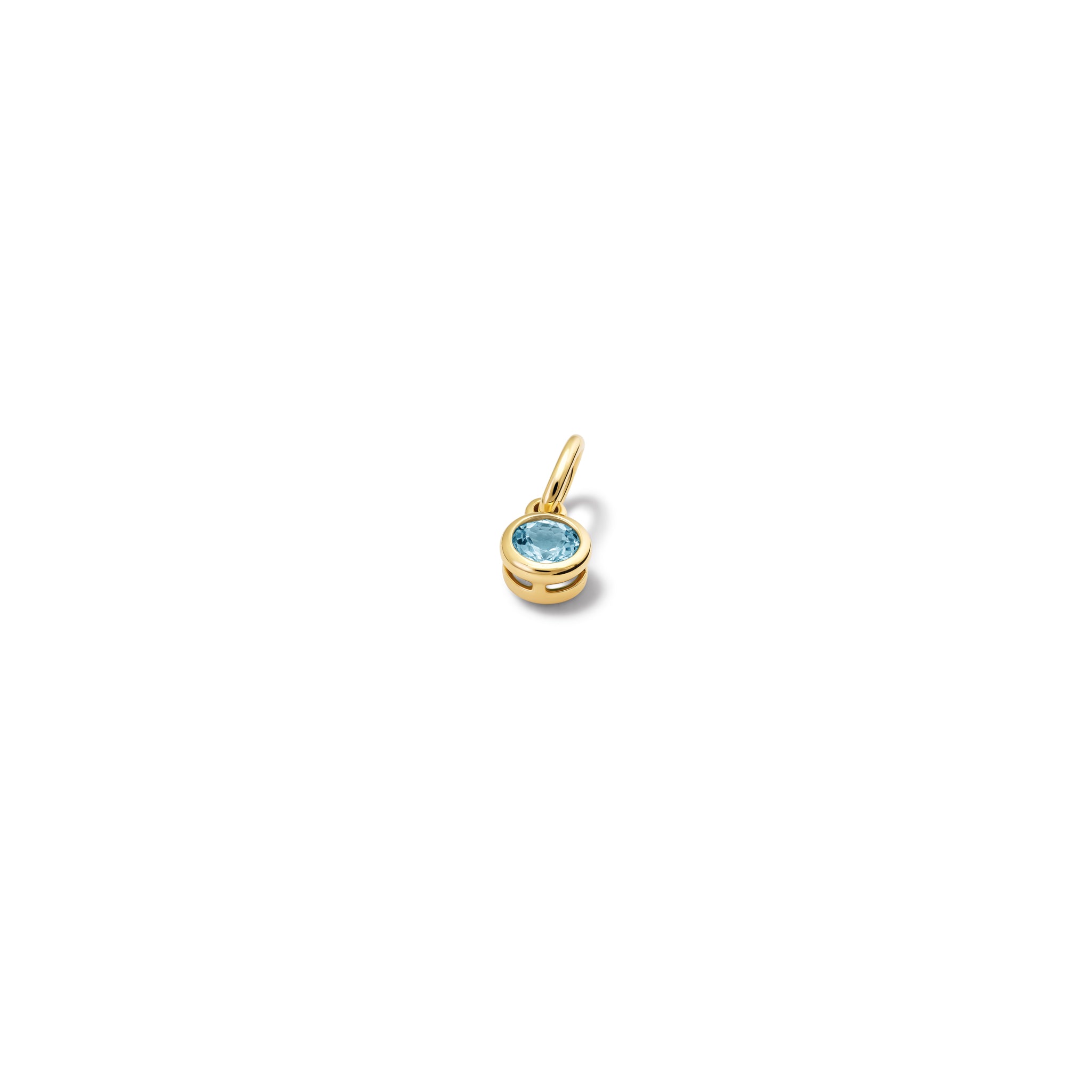 Handcrafted necklace pendant in yellow gold featuring a round blue topaz drop, birthstone of November.