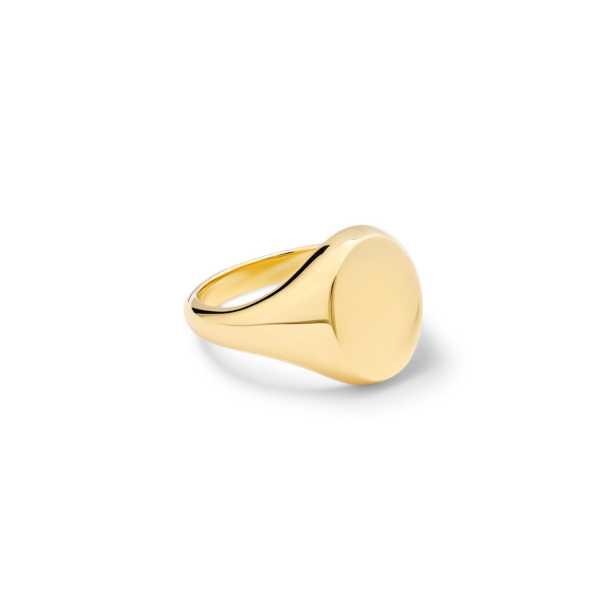 Handcrafted yellow gold signet ring featuring a large oval shape.