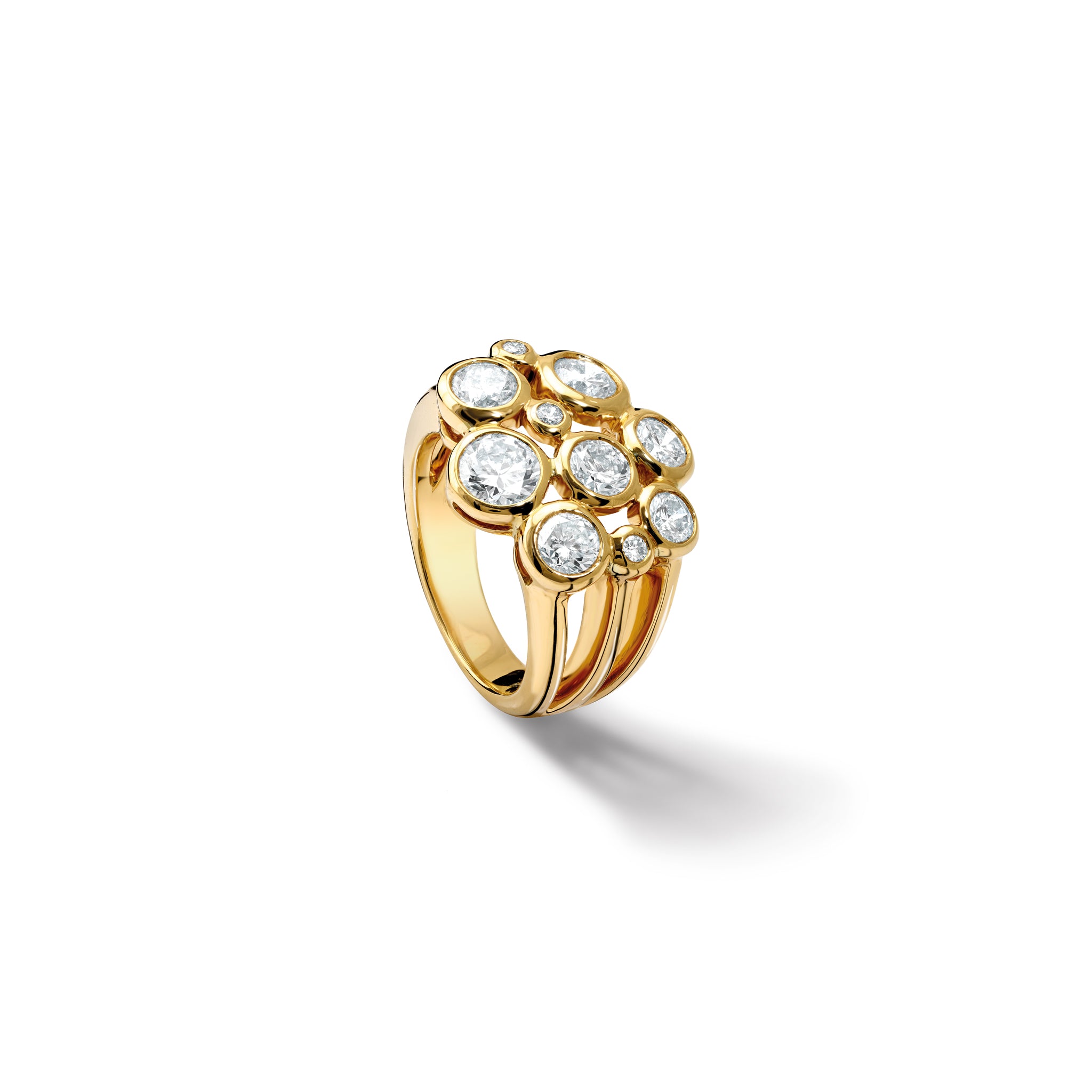 Handcrafted 18ct yellow gold ring featuring different sized round diamonds.