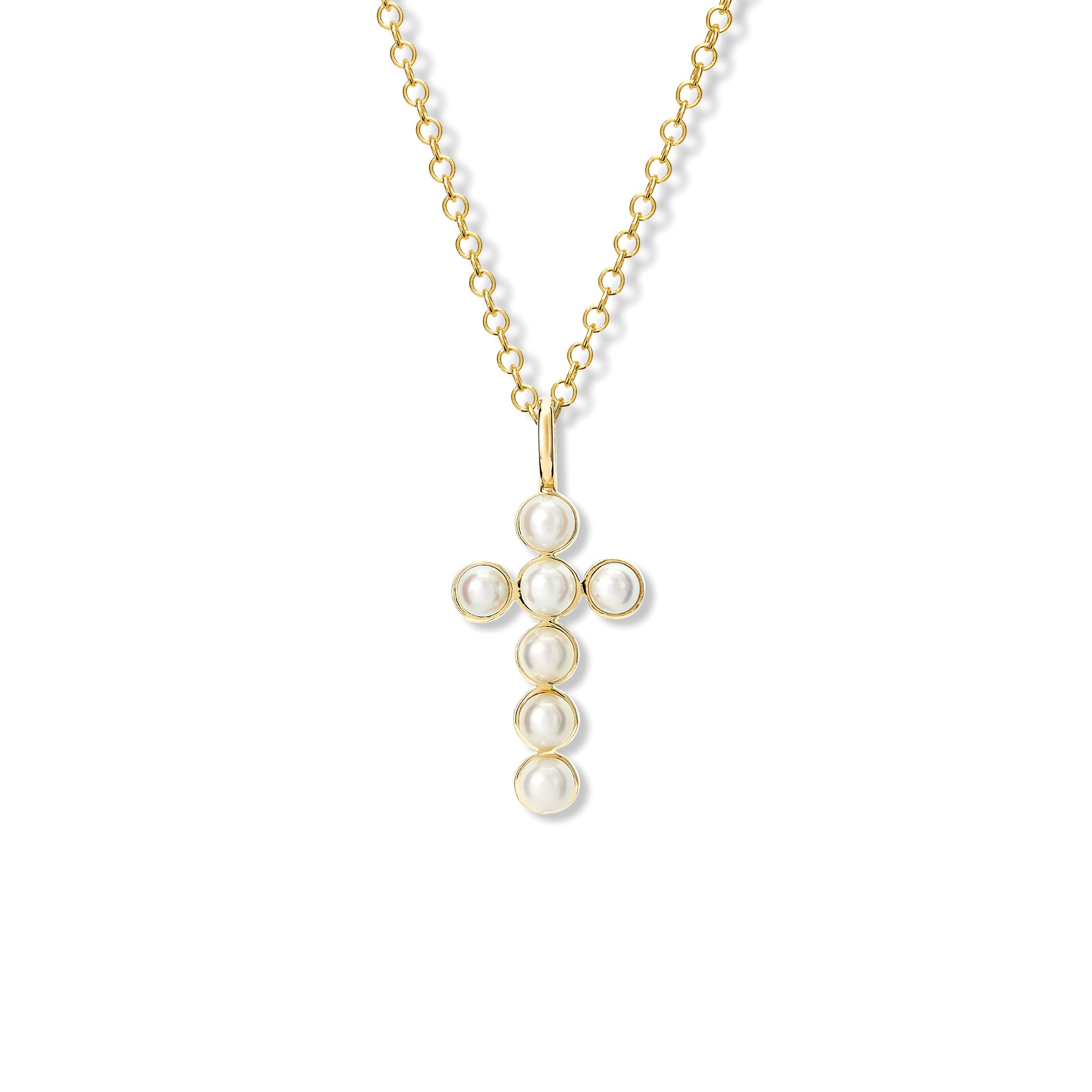 Handcrafted cross in yellow gold set with pearls, birthstone of June, hanging from a necklace chain.