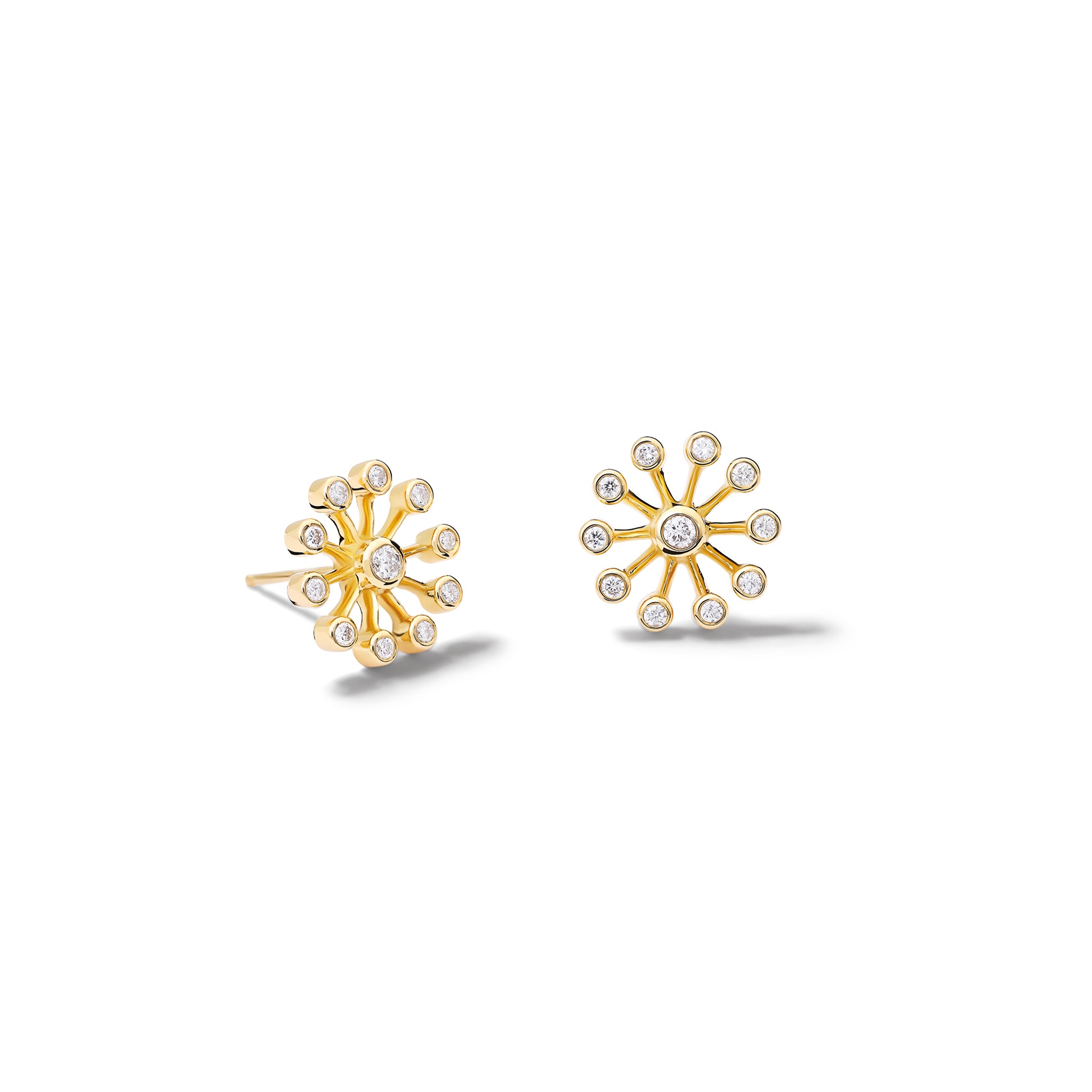 Handcrafted 18ct yellow gold necklace pendant inspired by the delicate spurs of an astrantia flower, with diamonds set at the tip of each spur.