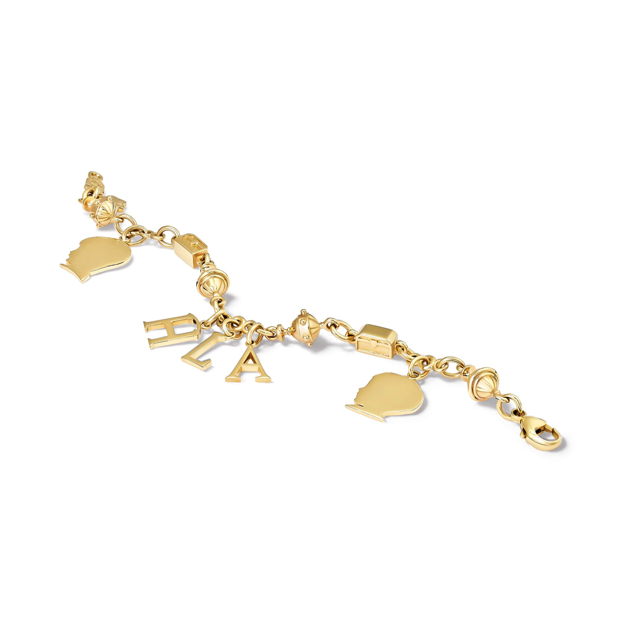 Handcrafted yellow gold charm bracelet featuring Three Kings charms and personalised charms.