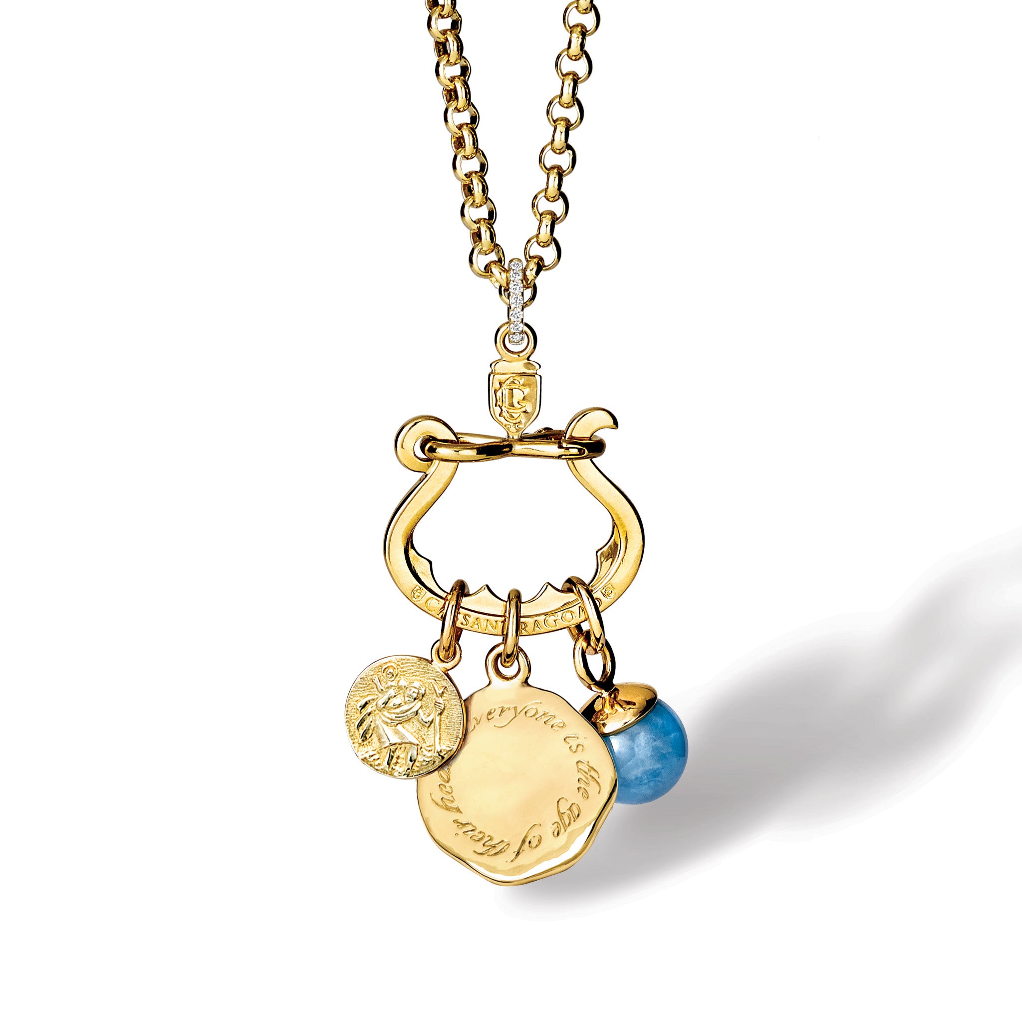 Handcrafted yellow gold necklace pendant with three distinct charms elegantly suspended from it, set with diamond pav�.