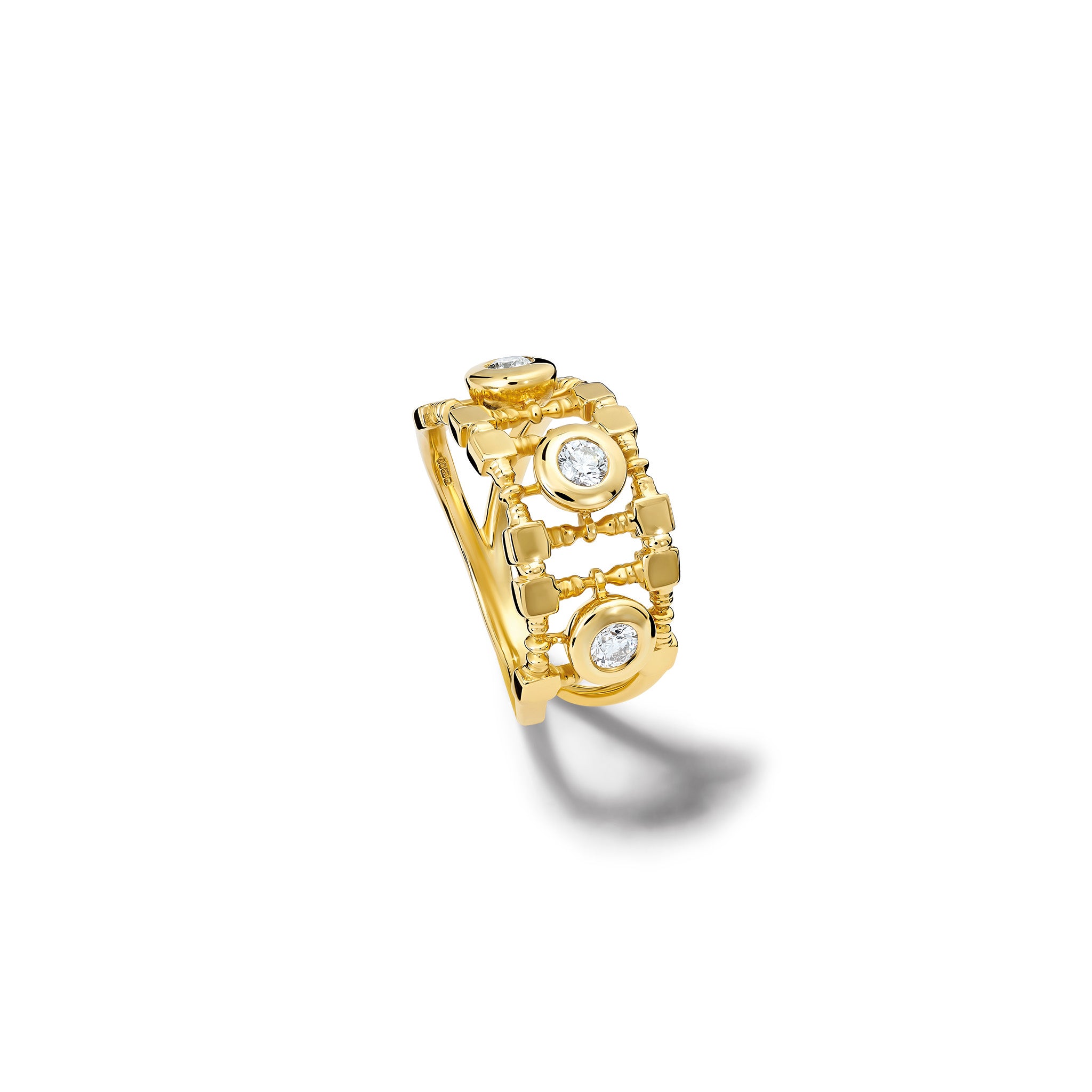 Handcrafted 18ct yellow gold ring featuring a trellis shaped frame with diamonds.