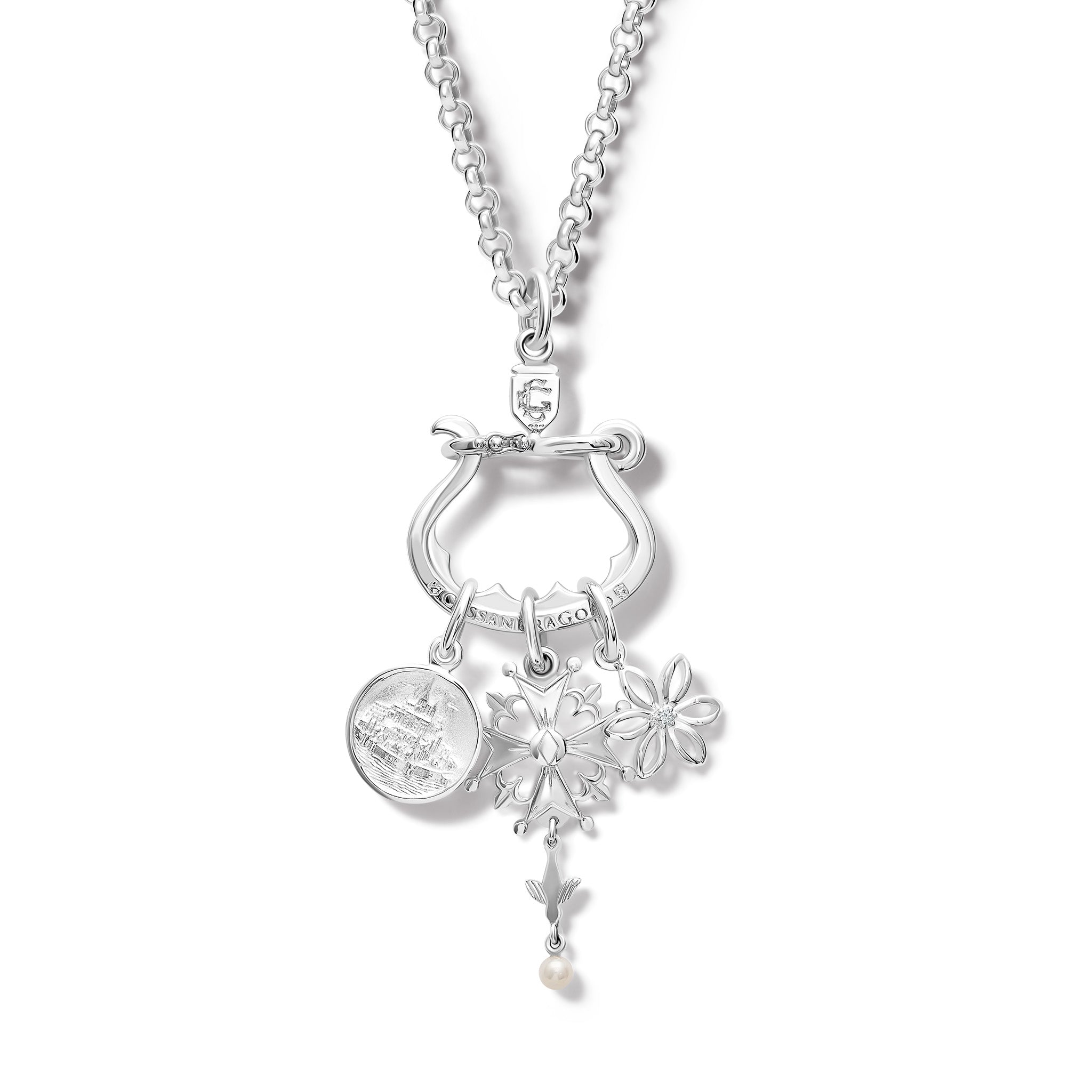 Handcrafted sterling silver necklace pendant with three distinct charms elegantly suspended from it.