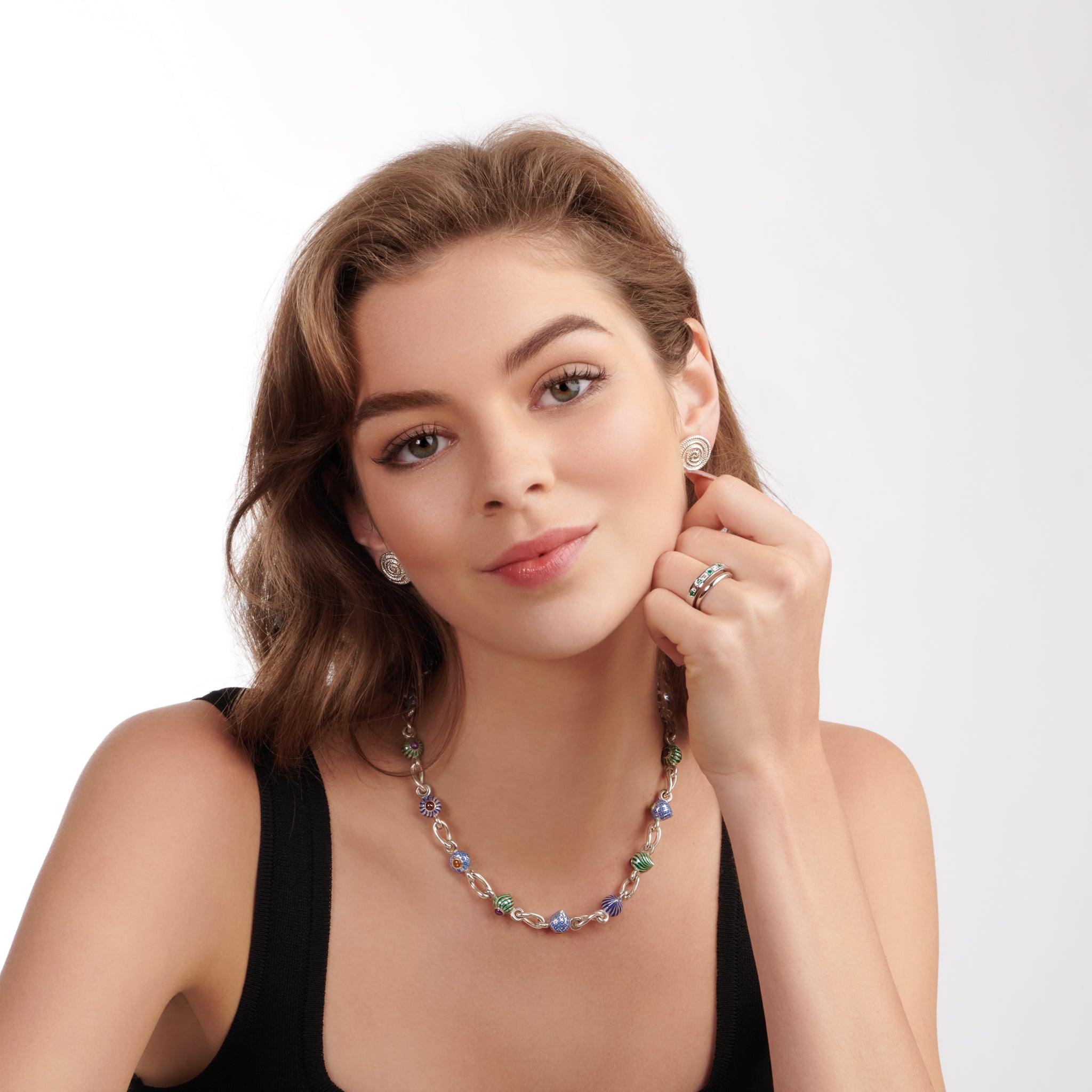 Model wearing a handcrafted 18ct white gold wedding band with a width of 2mm.