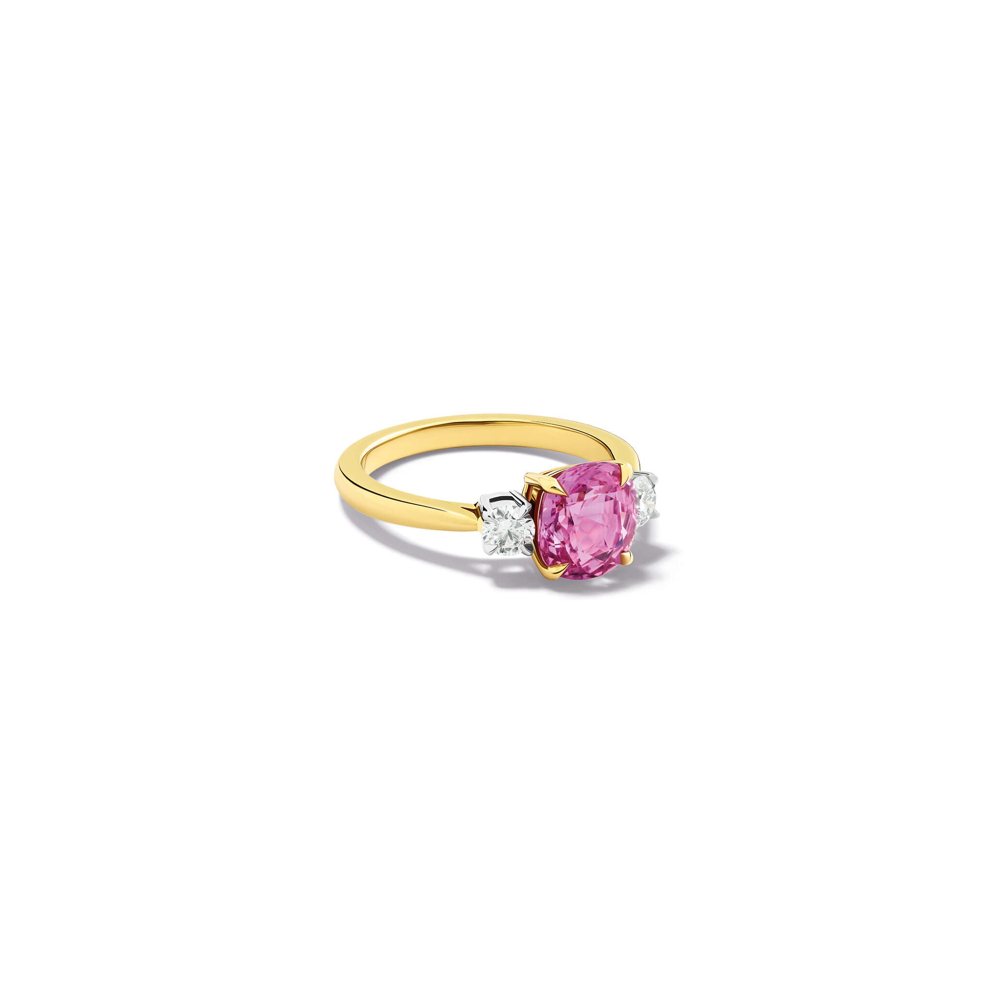 Handcrafted Delilah engagement ring in 18ct yellow and white gold with pink sapphire and diamond.