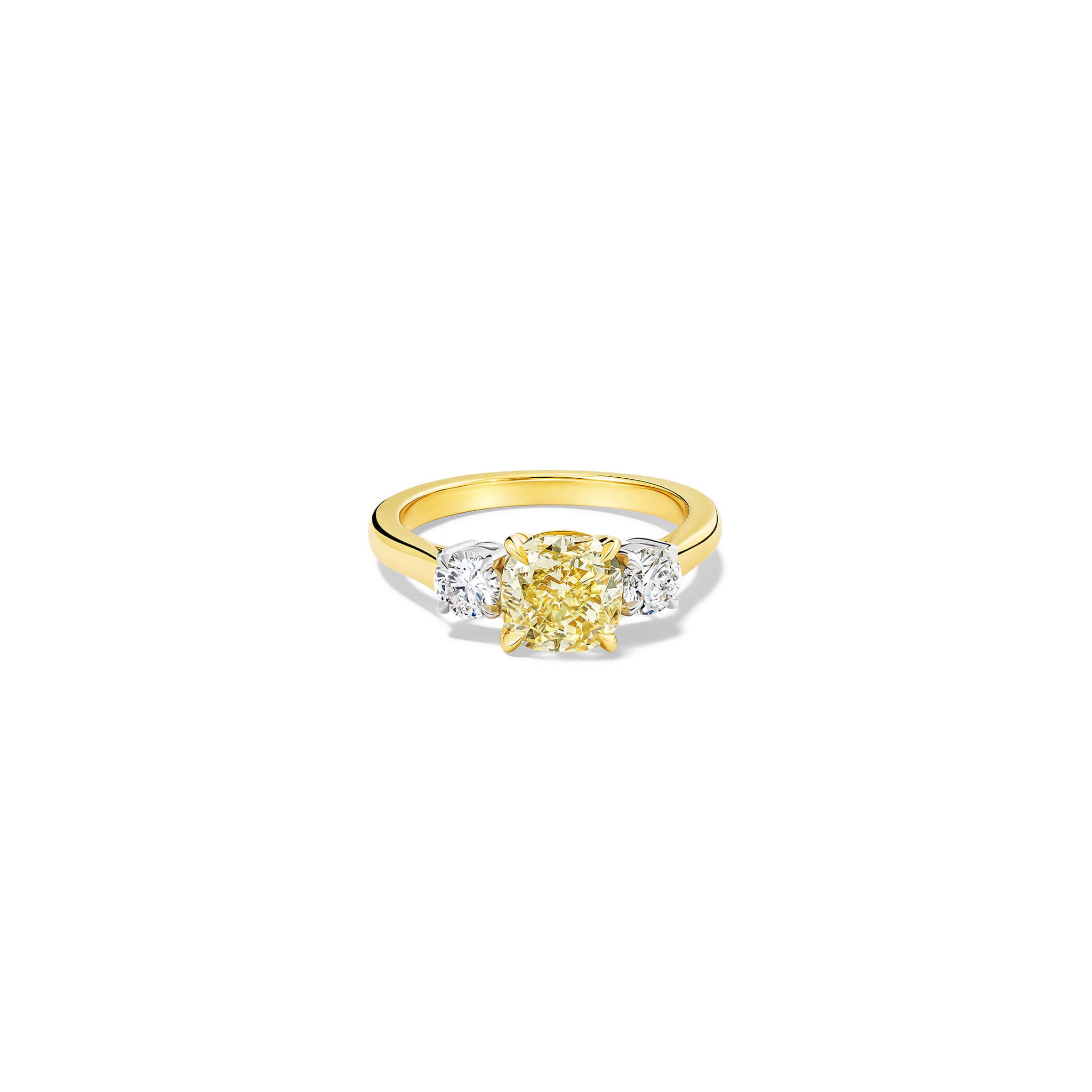 Handcrafted yellow gold yellow diamond engagement ring with two diamonds set in white gold on each side