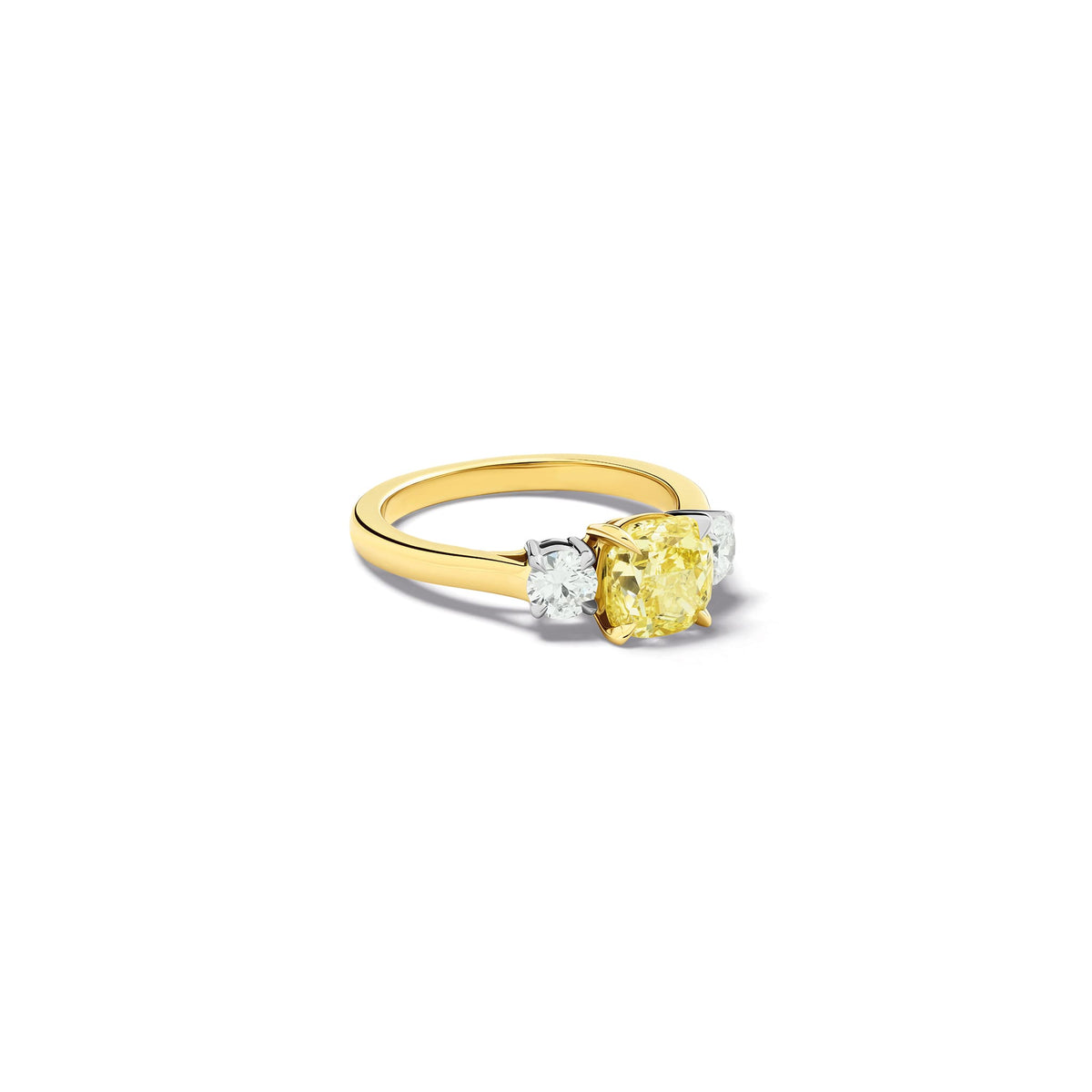 Handcrafted yellow gold yellow diamond engagement ring with two diamonds set in white gold on each side