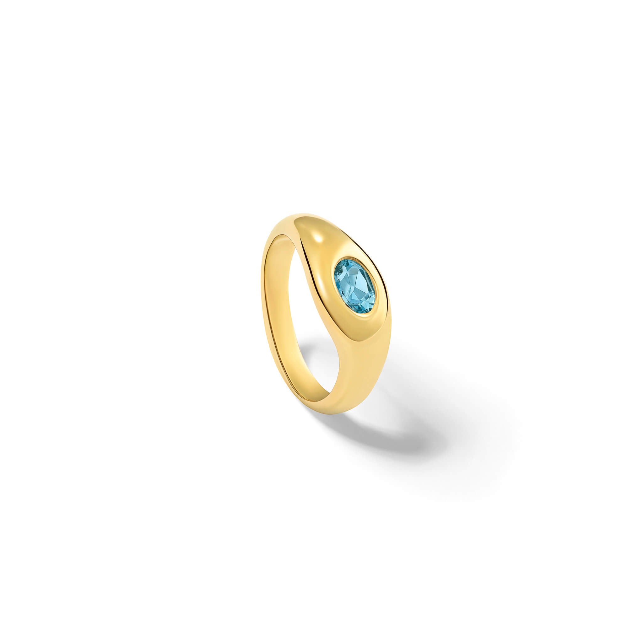 Handcrafted yellow gold ring with a slight teardrop design set with an oval facetted blue aquamarine, march birthstone