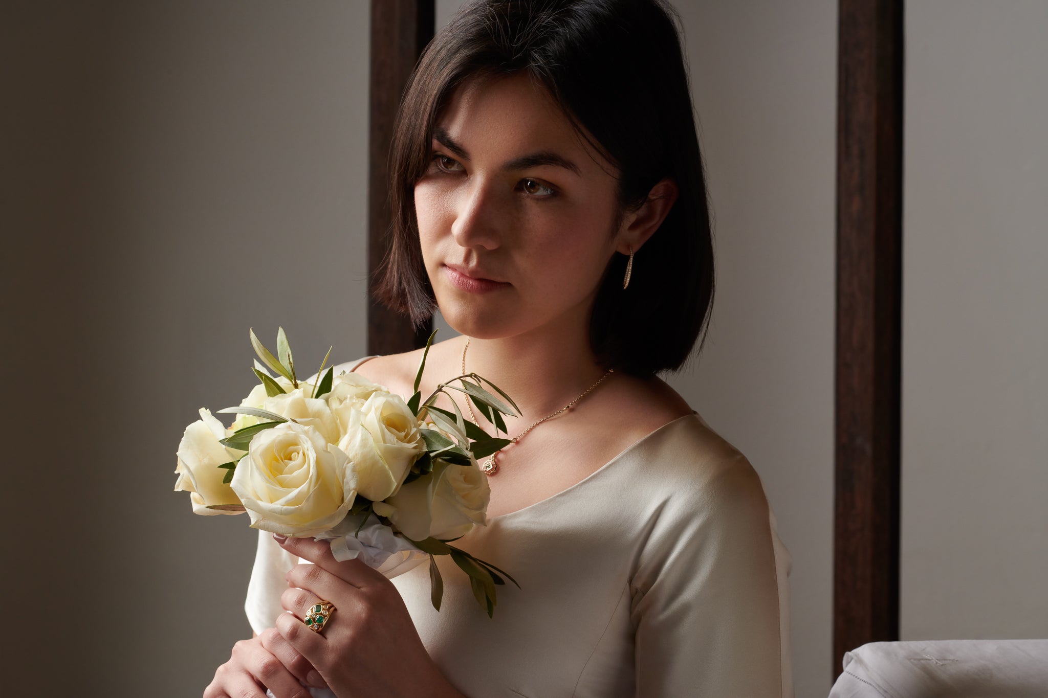Model wearing handcrafted yellow gold jewellery with diamonds, perfect for a bride.