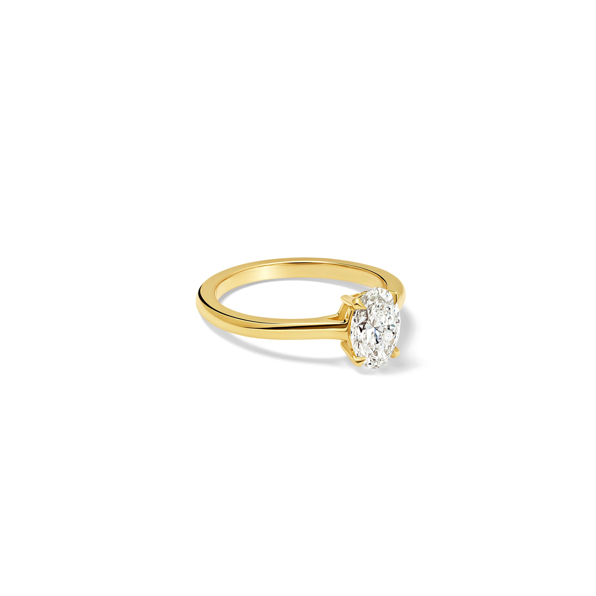 Handcrafted Lilia engagement ring in yellow gold with oval diamond