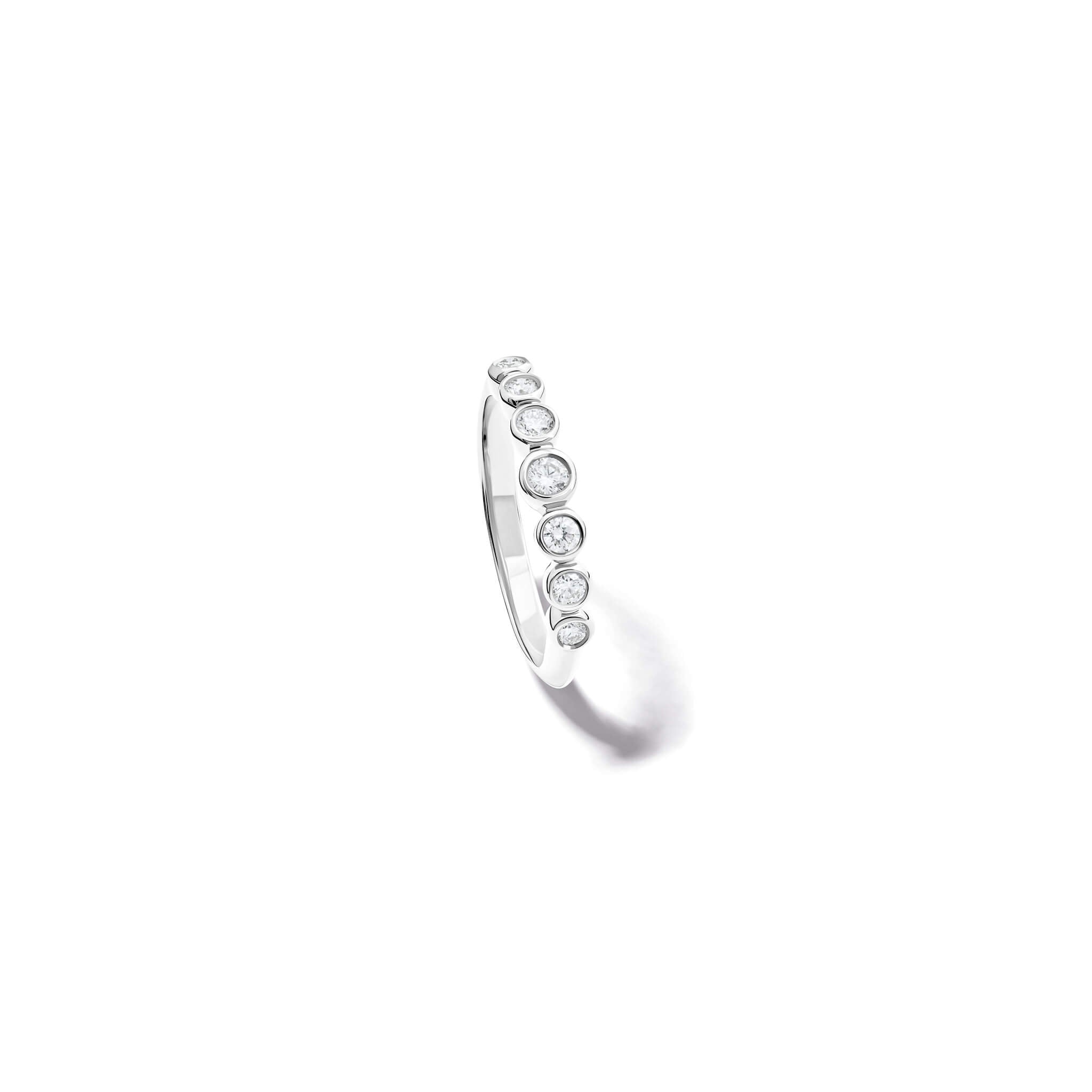 Handcrafted 18ct gold half eternity ring with diamonds.