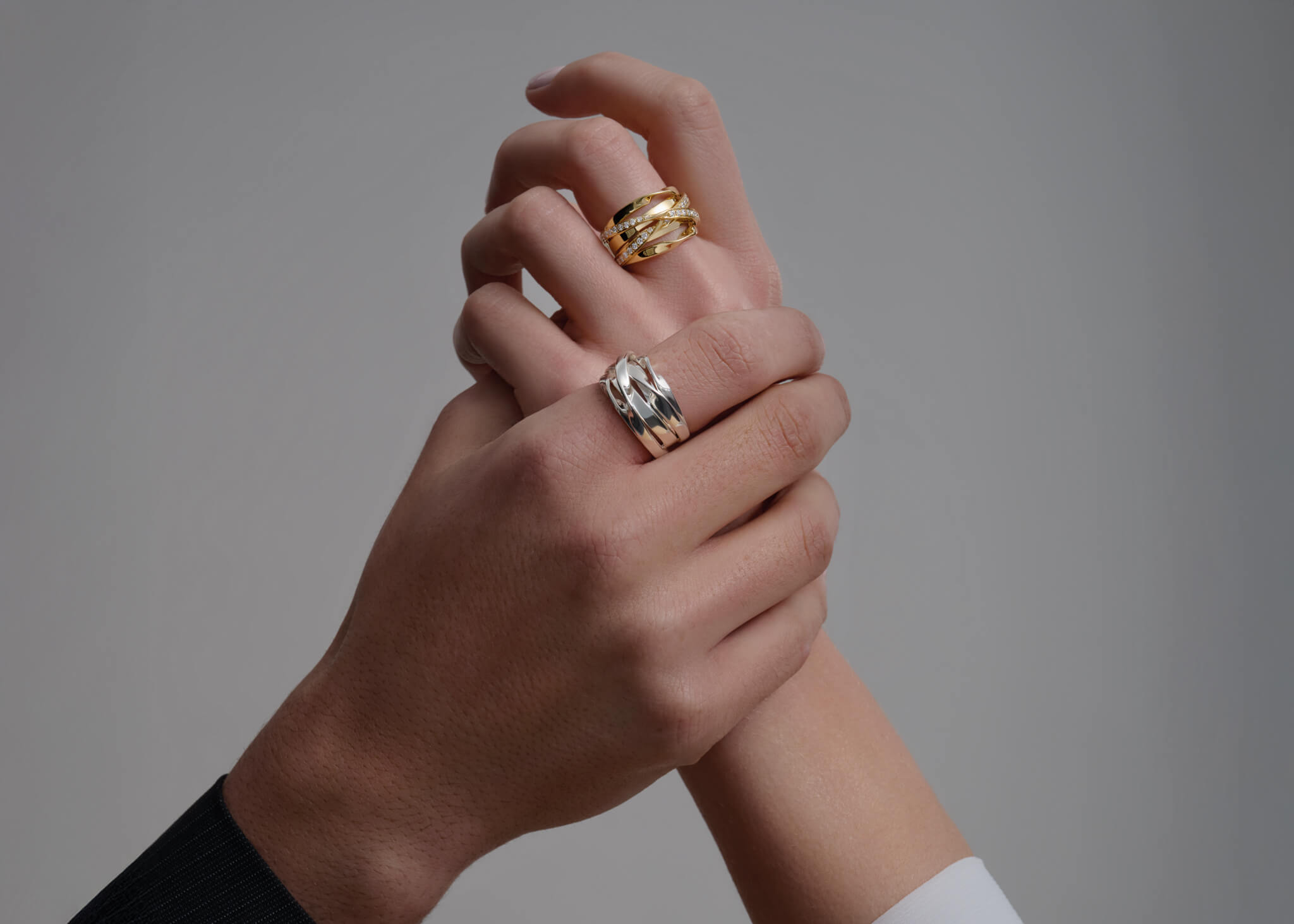 Models wear Tagliatelle rings