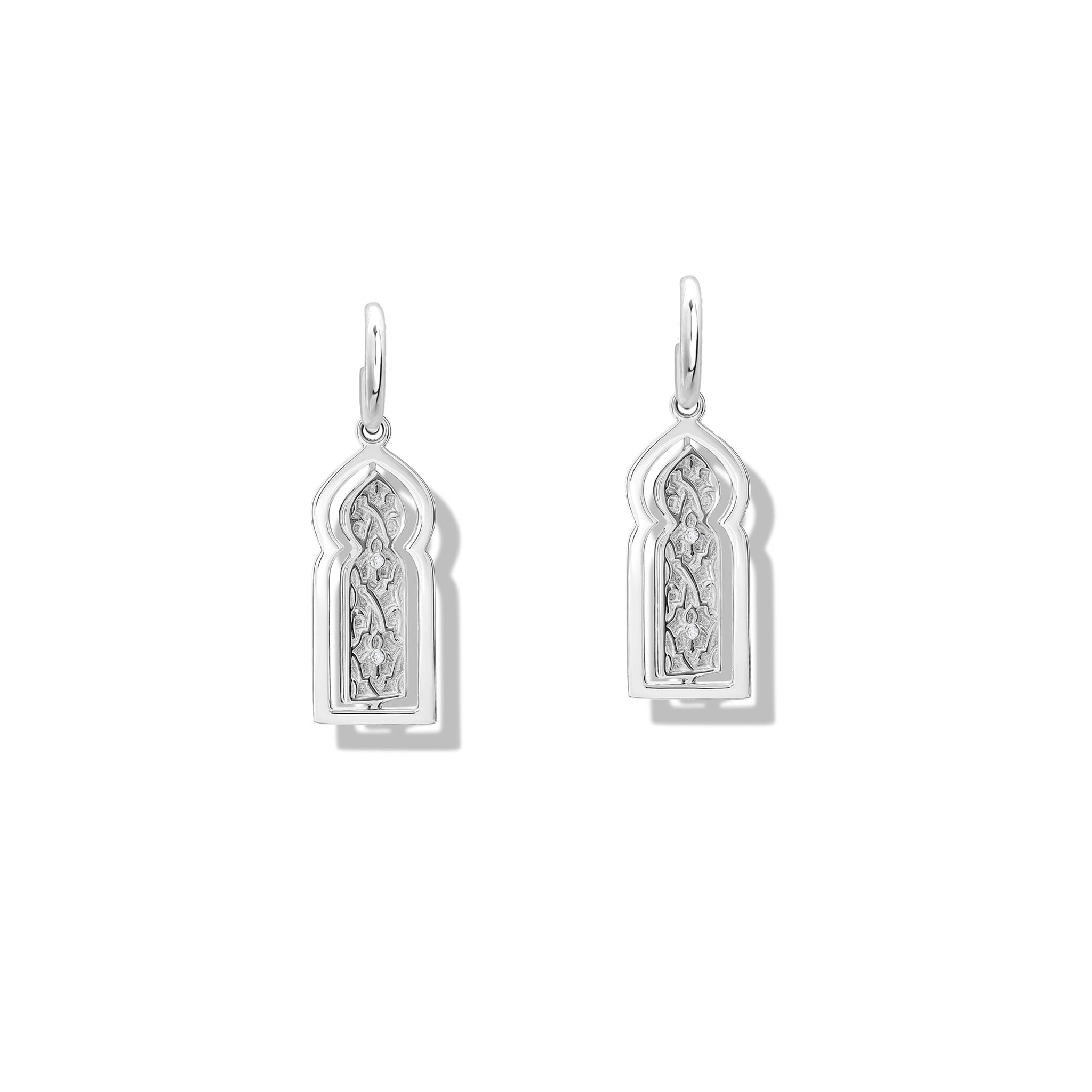Handcrafted sterling silver earring drops featuring a narrow door with diamonds.