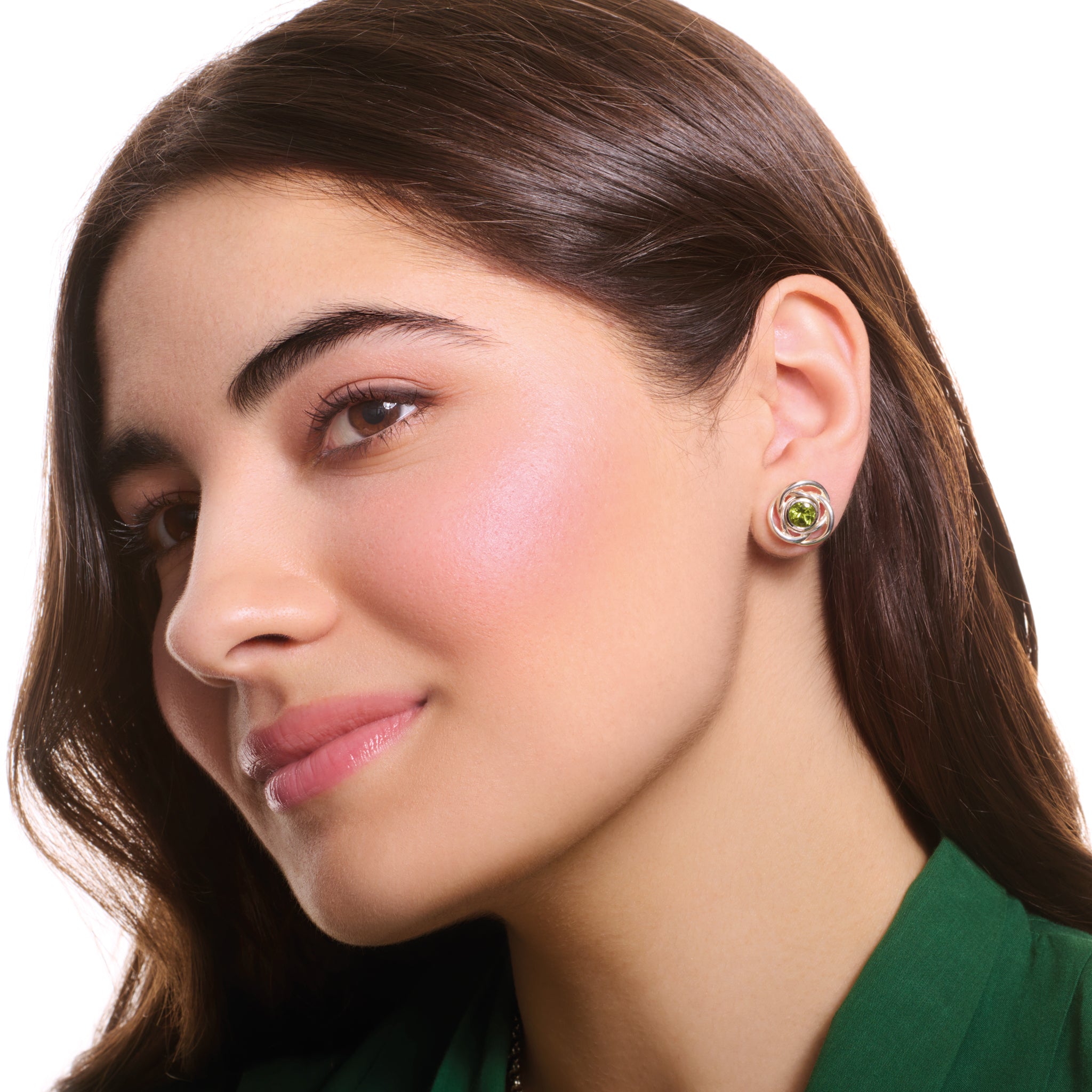 Model wearing handcrafted sterling silver earring halos featuring three layered circles.