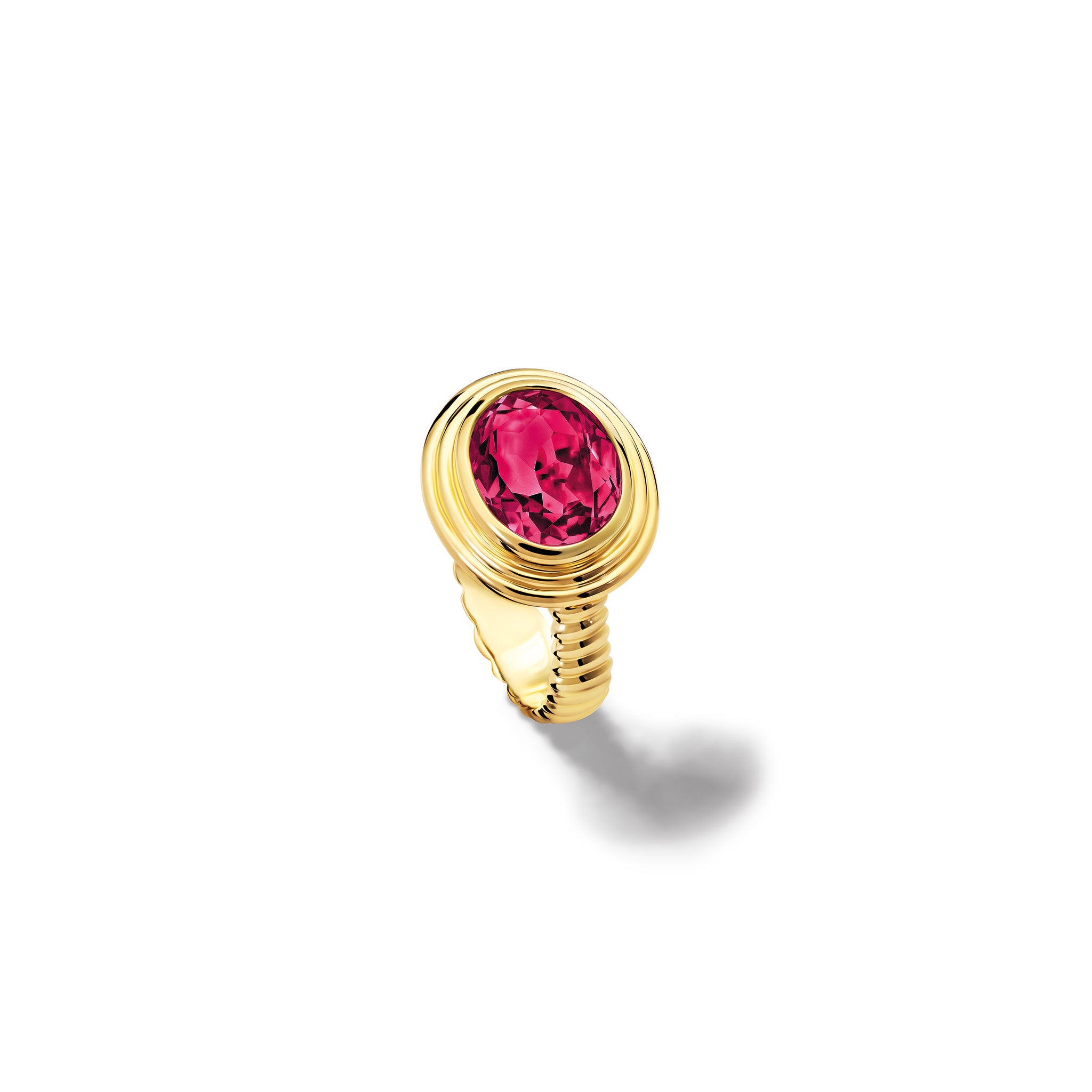 Handcrafted 18ct yellow gold ring featuring a prominent oval pink rhodolite garnet, january birthstone