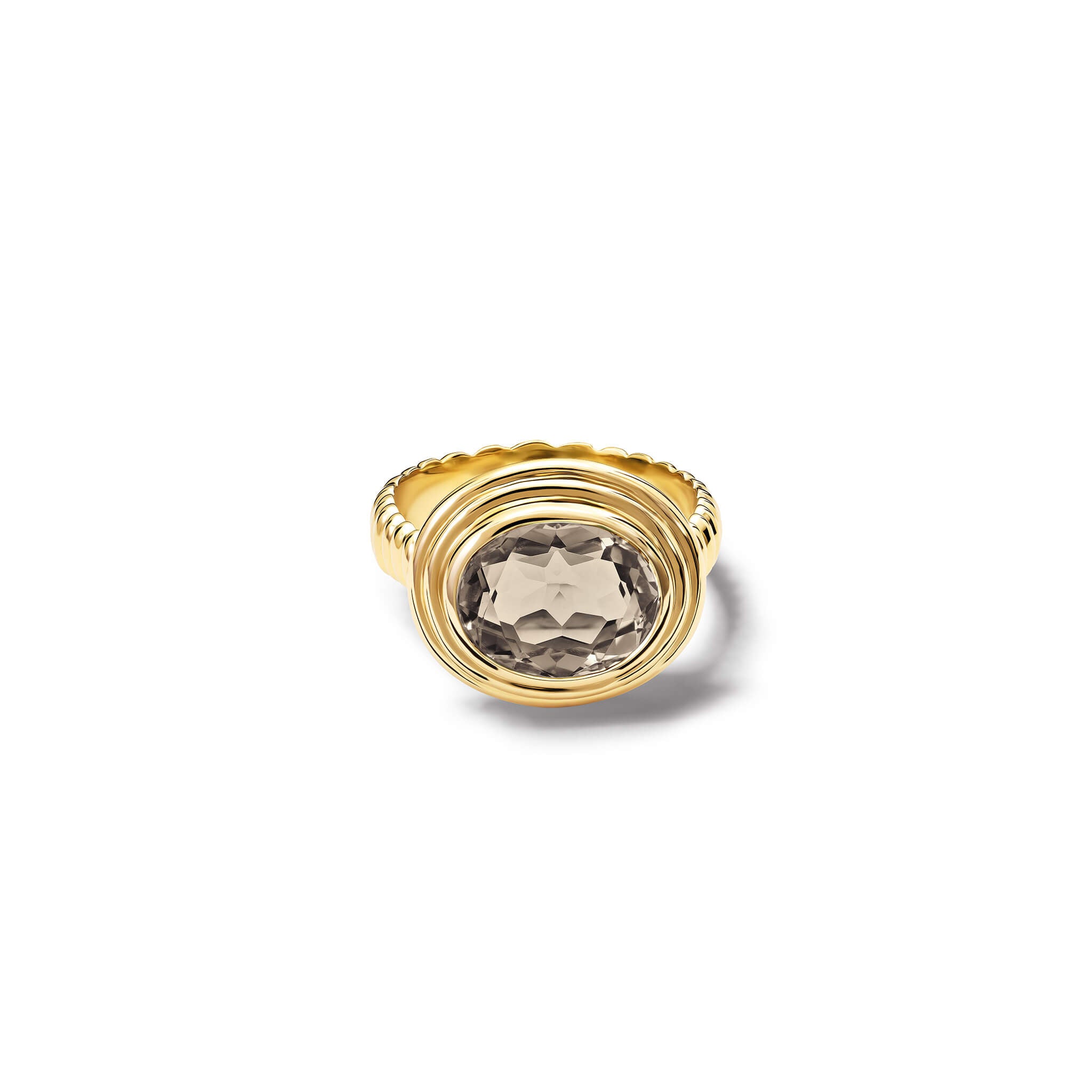 Handcrafted yellow gold ring featuring a prominent oval smoky quartz