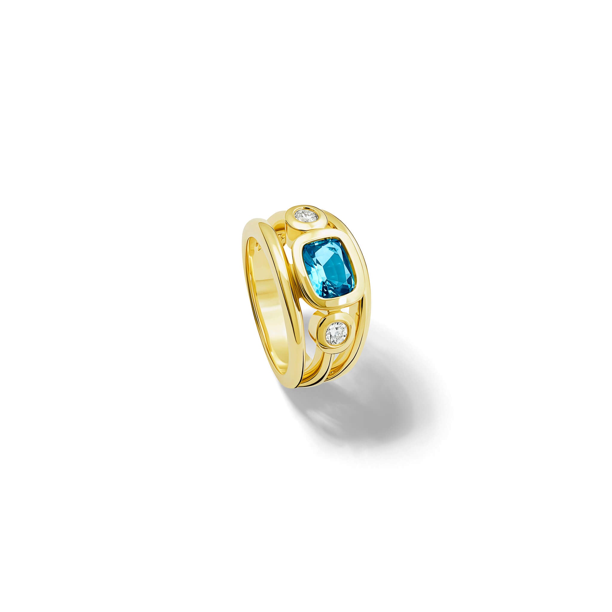 Handcrafted 18ct yellow gold ring with a central cushion cut aquamarine, the birthstone of March, flanked by two round diamonds.