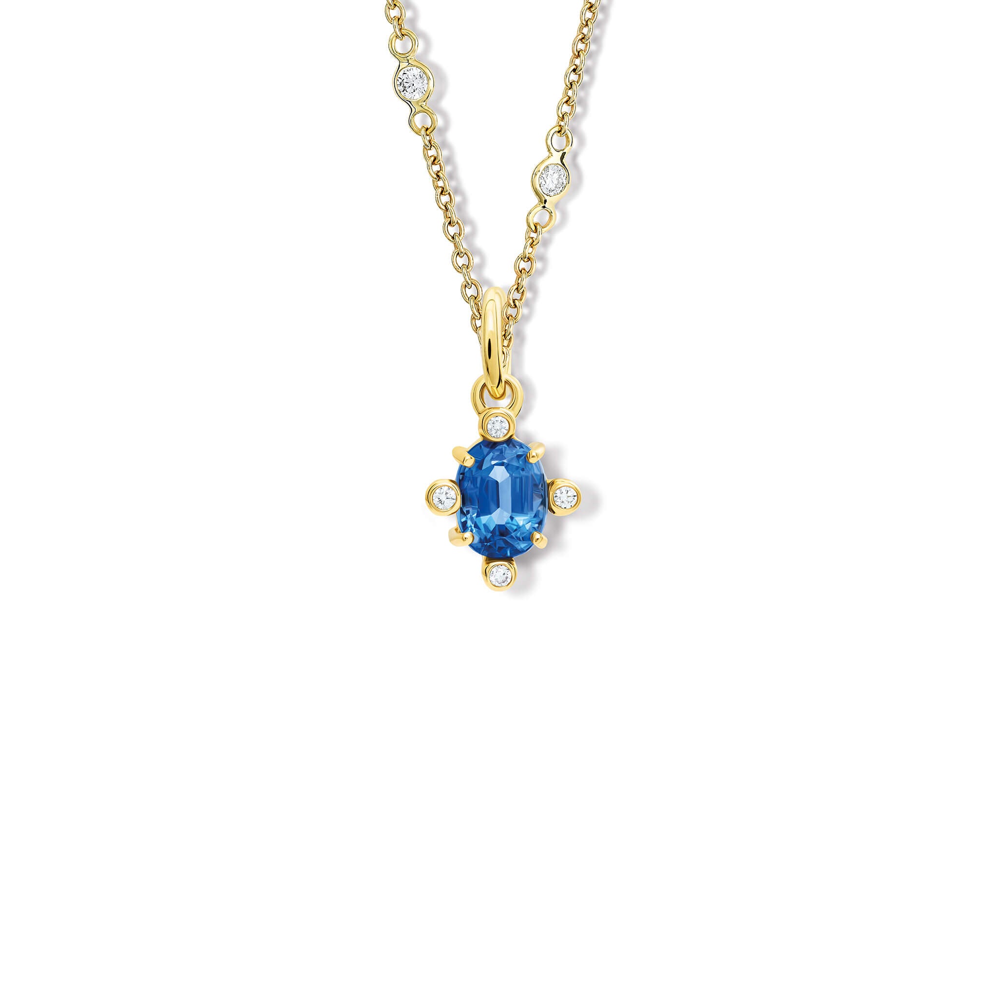 Handcrafted 18ct yellow gold Compass pendant with facetted oval kyanite set with four diamonds.