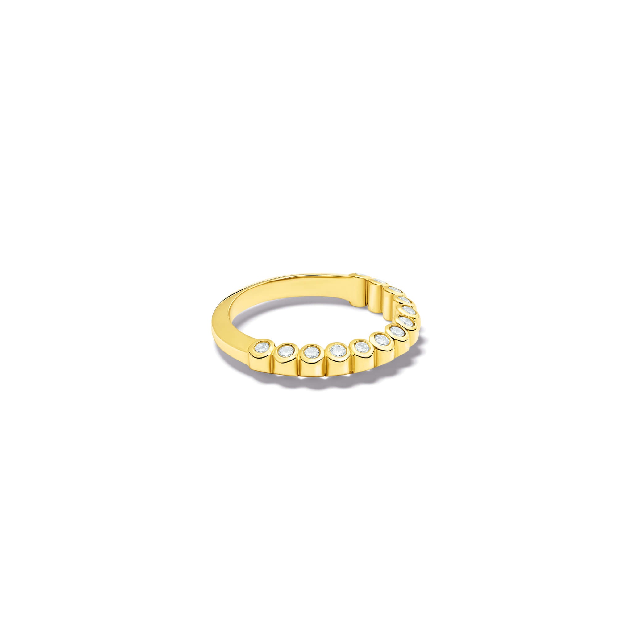 Handcrafted 18ct yellow gold eternity ring with diamonds on the side of the shank and smooth ridges along the top.