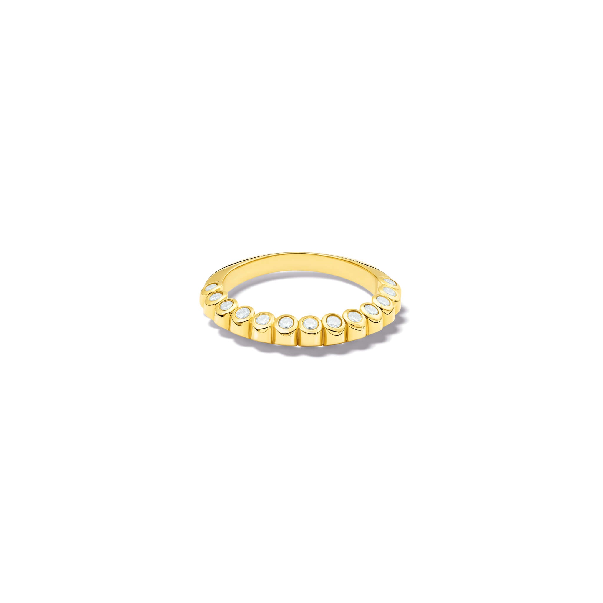 Handcrafted 18ct yellow gold eternity ring with diamonds on the side of the shank and smooth ridges along the top.