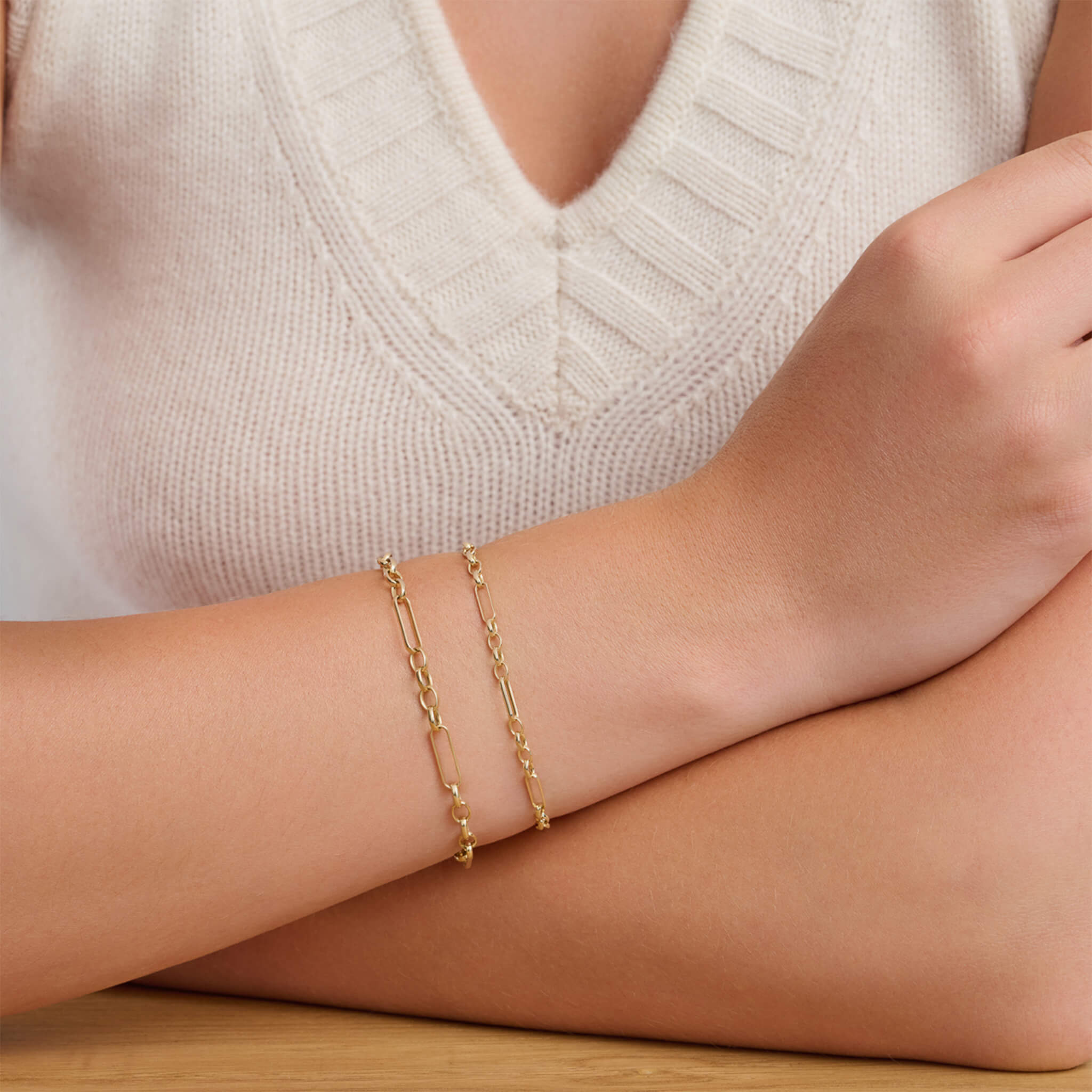 Handcrafted yellow gold chain bracelet featuring oval and rectangular links.