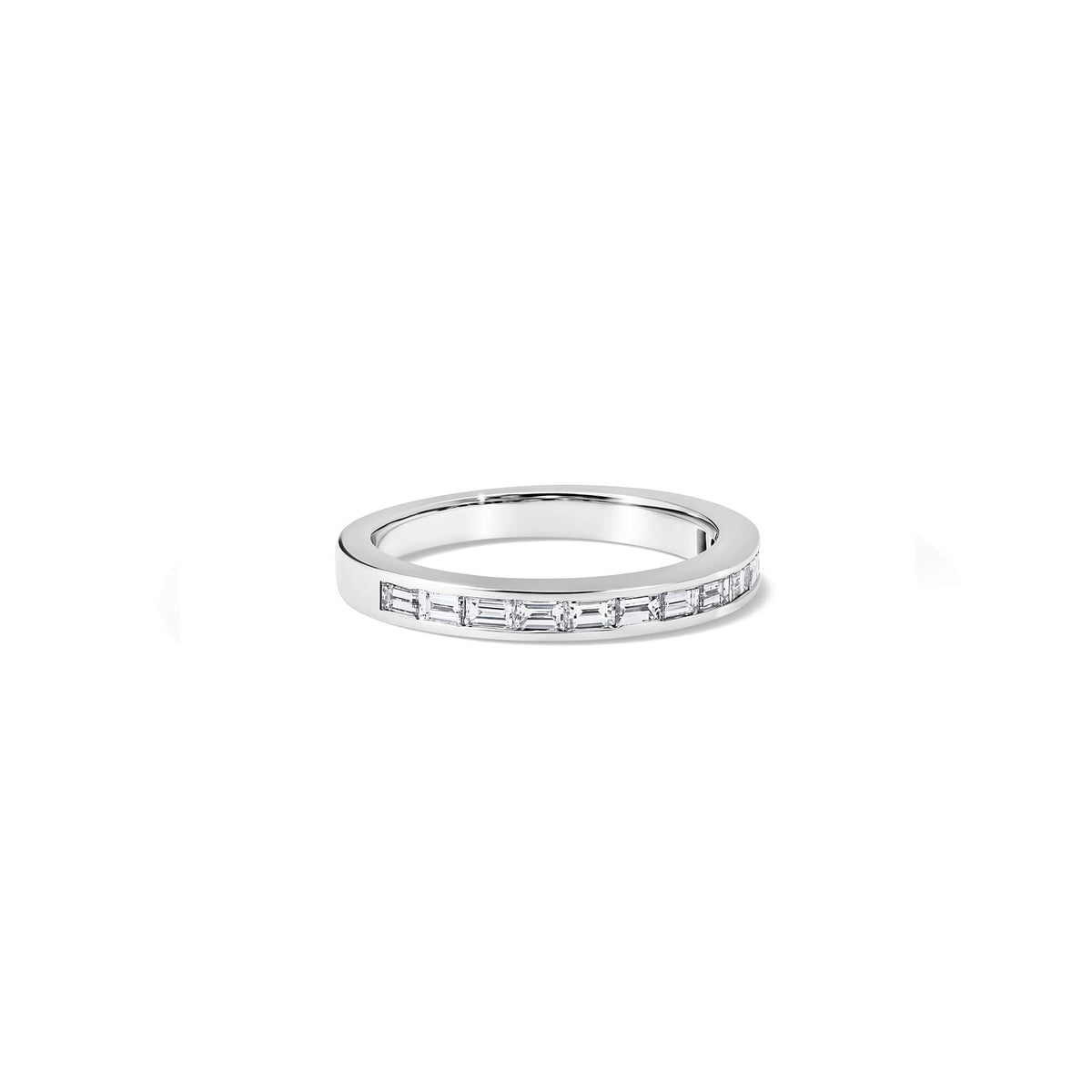Handcrafted Elvira half-eternity ring in 18ct white gold with baguette cut diamond