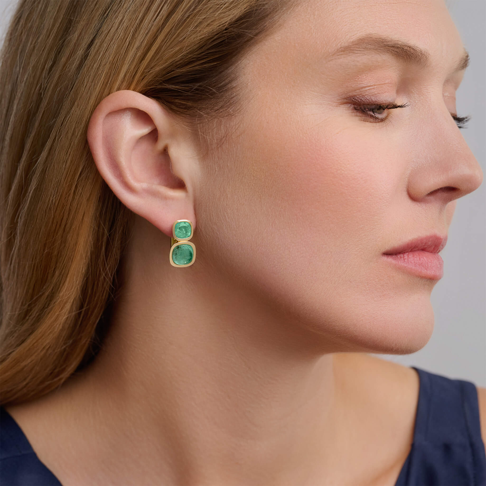 Handcrafted 18ct yellow gold square shaped earrings featuring rare facetted emerald and rare cabochon emerald, birthstone of May