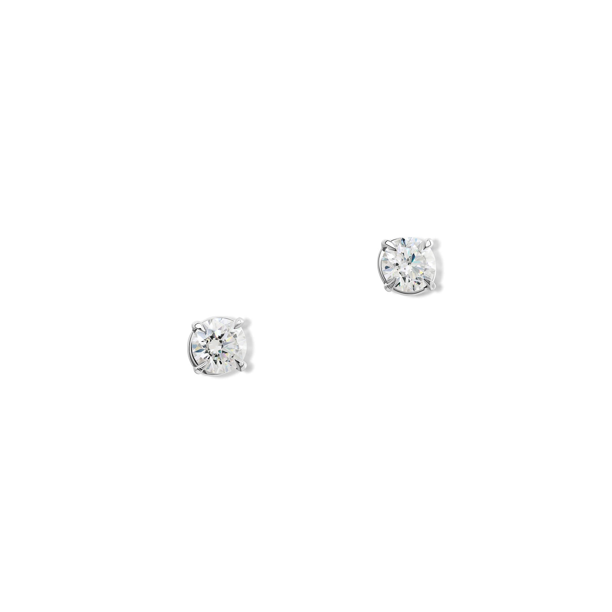 Handcrafted 18ct white gold stud earrings featuring round diamond, birthstone of april.