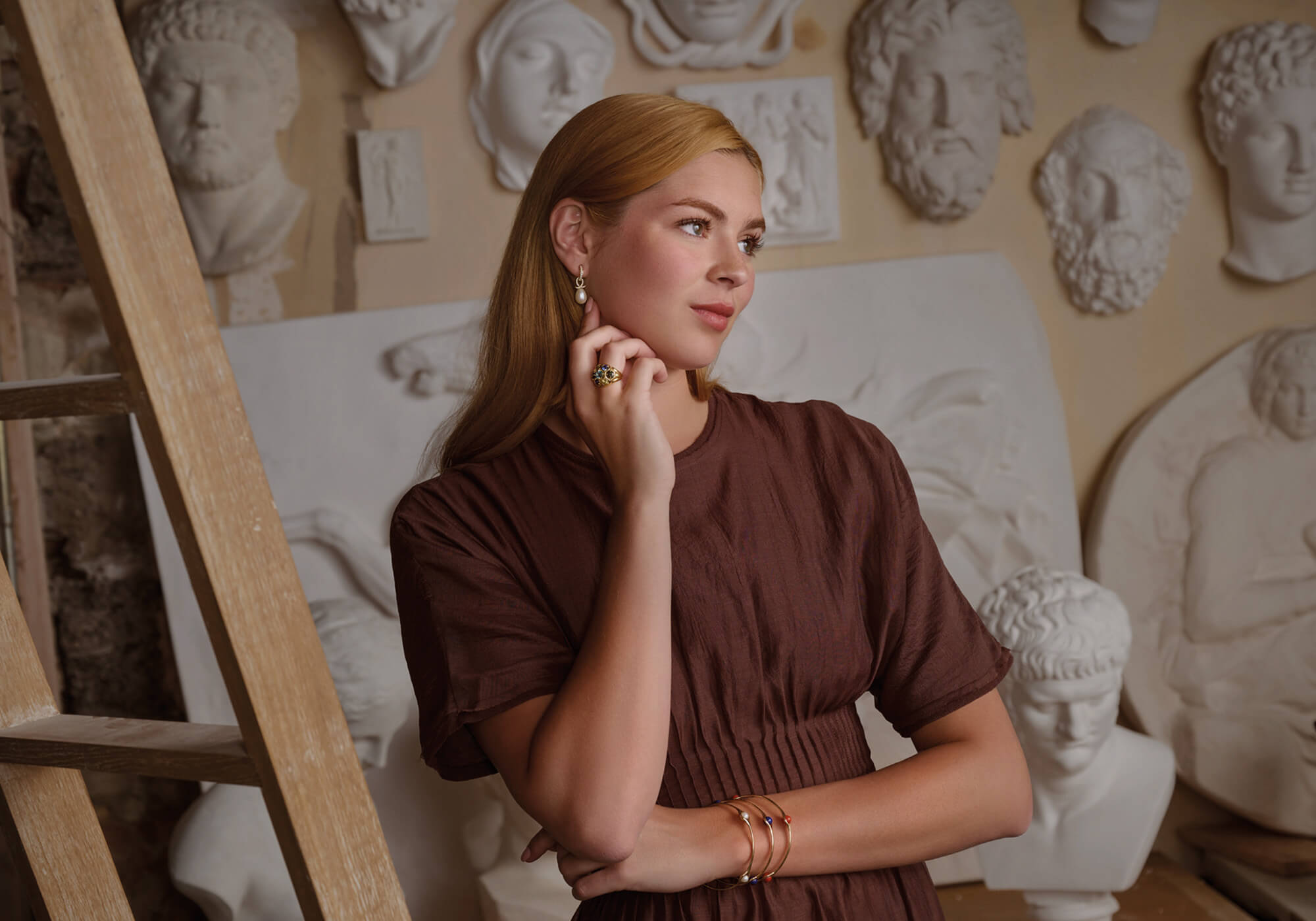 Model wearing handcrafted fine jewellery inspired by greece, precious gemstones