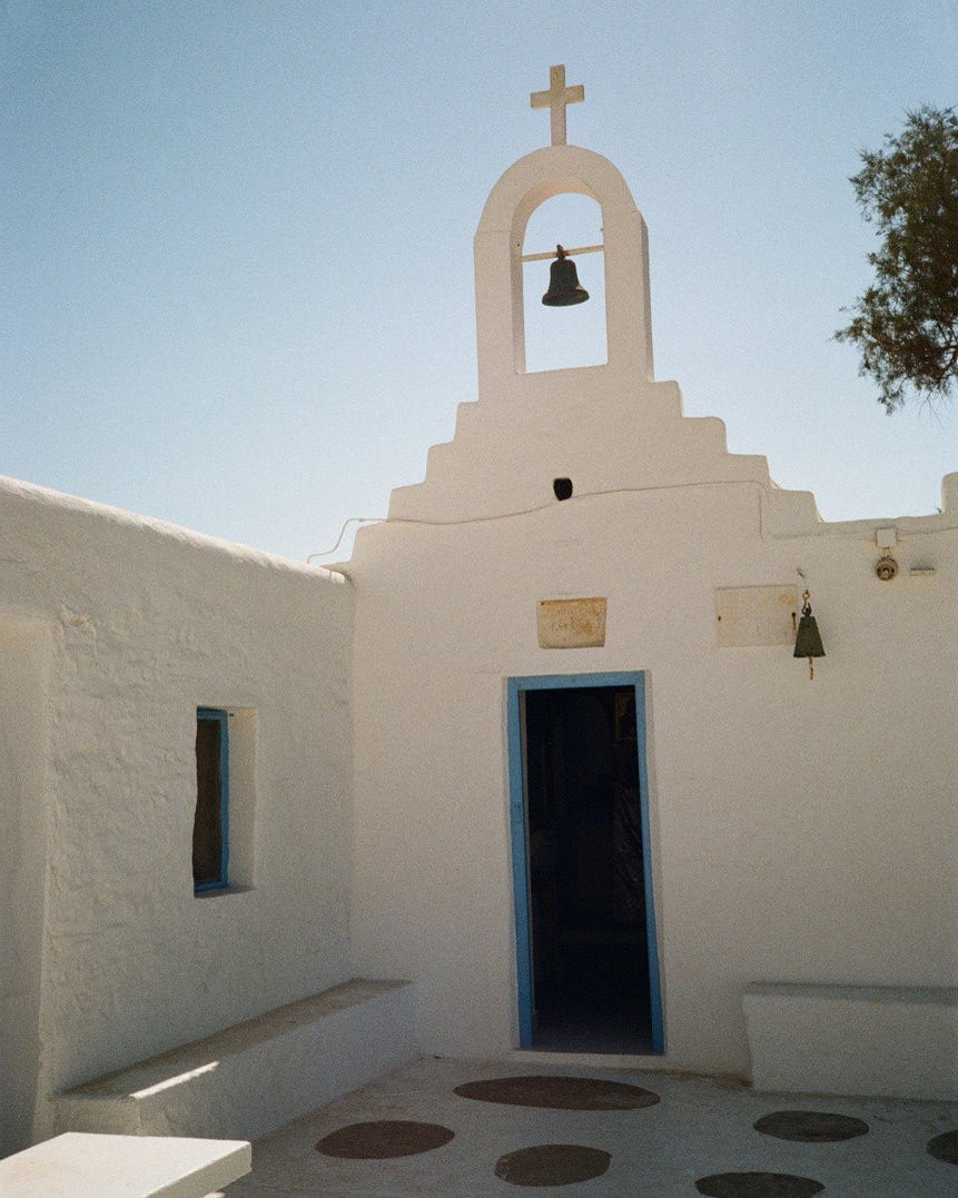 Traditional white Greek Orthodox church on island