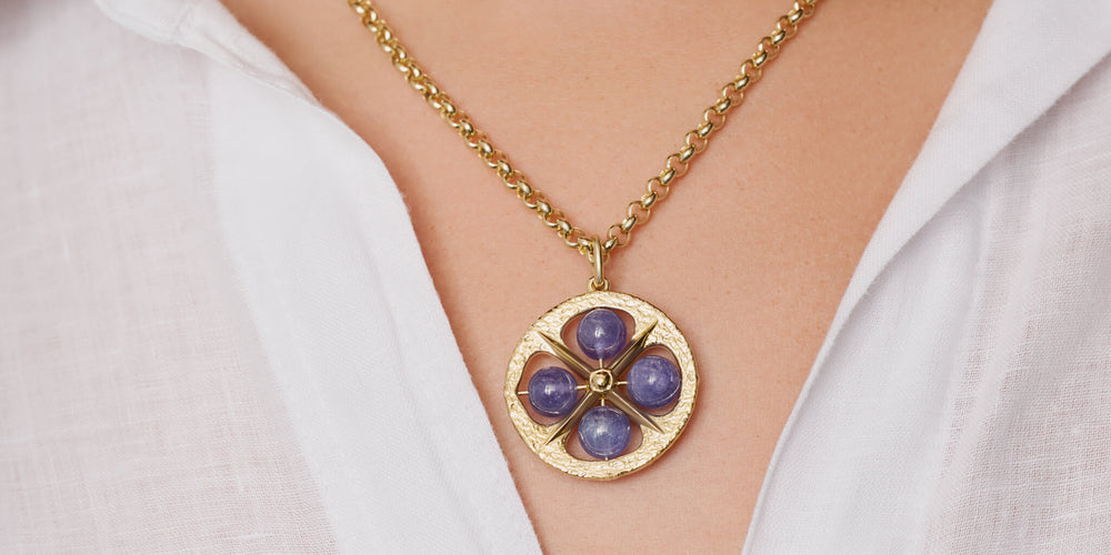 Yellow gold Helios necklace pendant with Tanzanite beads