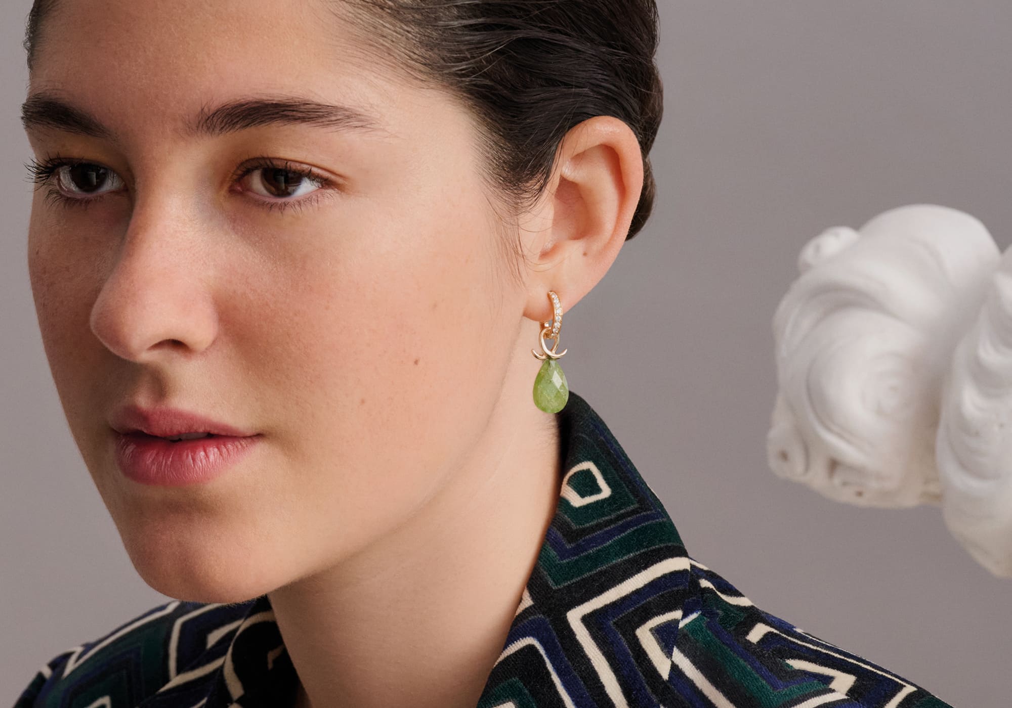 Model wears handcrafted Icarus earring drops