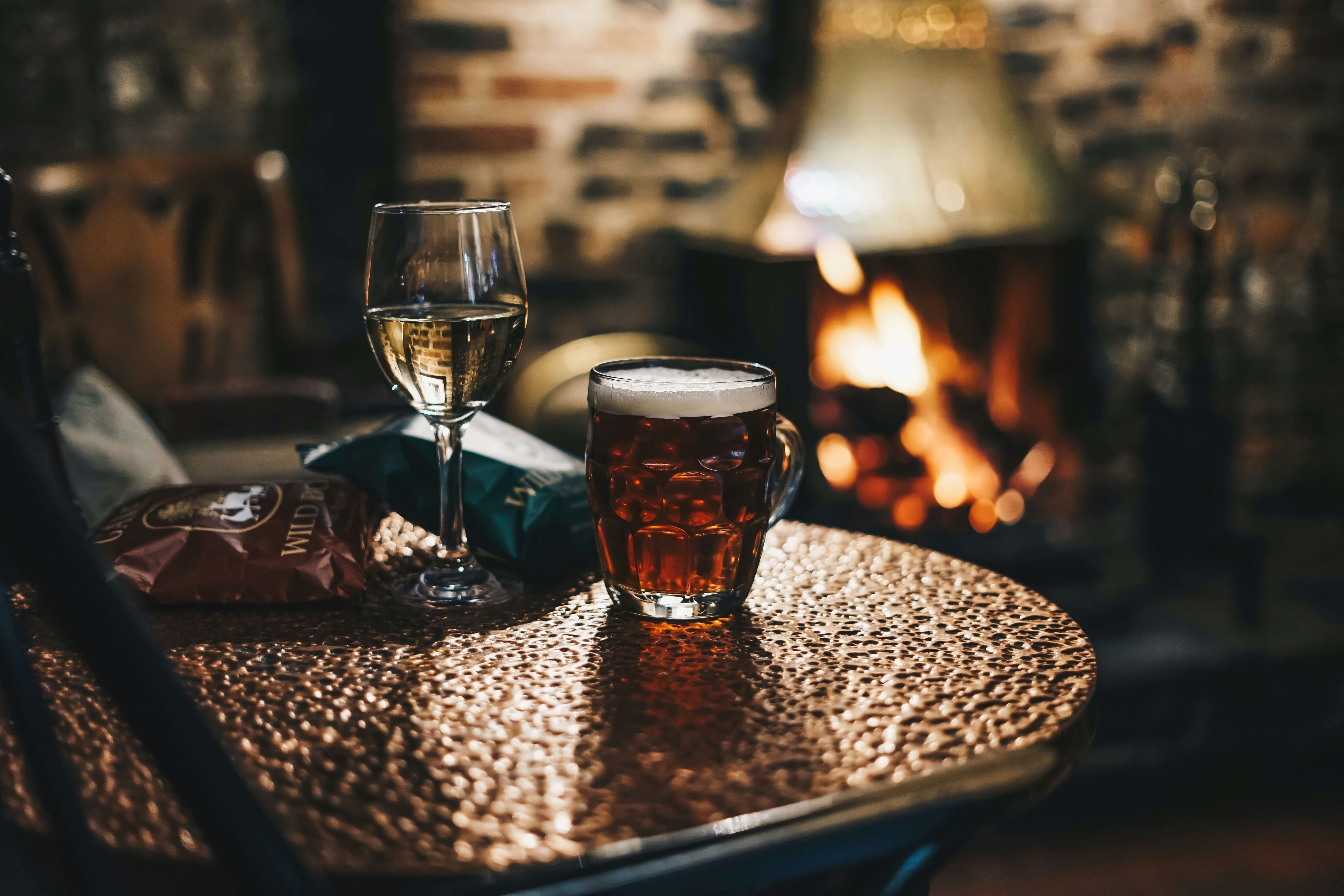 Beer and wine on a table at a London pub during Christmas.